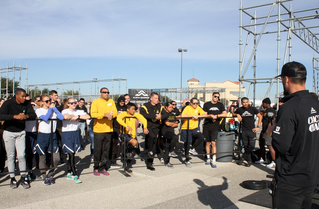 Members of the Air Force, Navy and Army teams receive an orientation of proving rig obstacles before the first Inter-service Alpha Warrior Final Battle Nov. 17, 2018, Retama Park, Selma, Texas. (U.S. Air Force photo by Debbie Aragon)