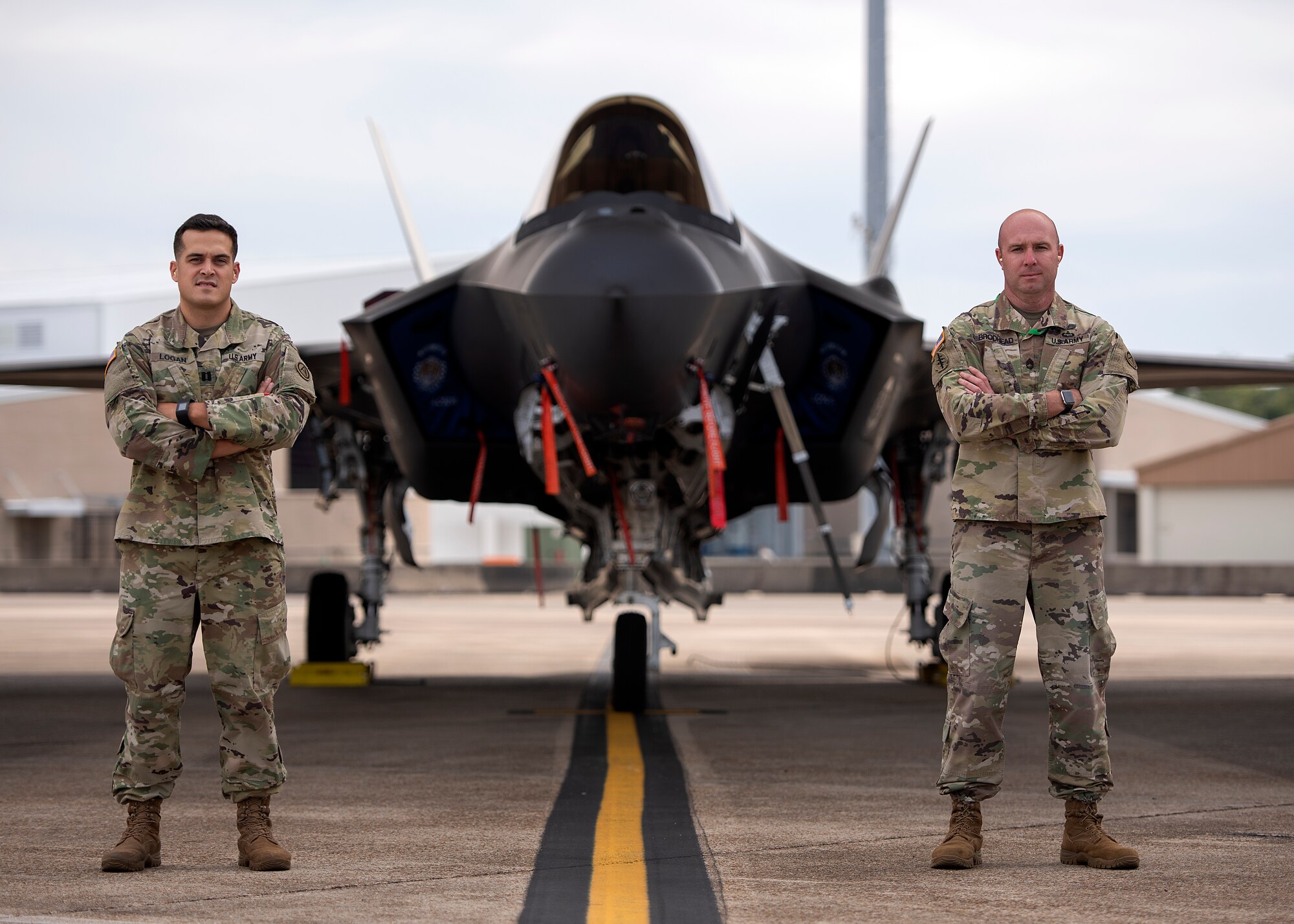 From left, U.S. Army Capt. John Logan and Sgt. 1st Class Patrick Brodhead, 33rd Operations Support Squadron ground liaison officers, stand in front of an F-35A Lightning II assigned to the 33rd Fighter Wing Nov. 6, 2018, at Eglin Air Force Base, Fla. Logan and Brodhead are the only Soldiers assigned to the 33rd FW, however their role is significant for the employment of the F-35A. As ground liaison officers their mission is to track, understand and brief the enemy ground formation from the battlefield to pilots and intelligence Airmen. (U.S. Air Force photo by Staff Sgt. Peter)
