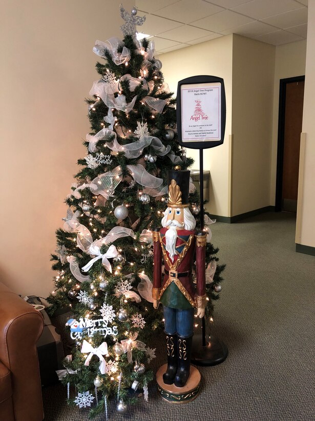 446th Airlift Wing Airman and Family Readiness Center's Angel Tree is decorated for the holidays. To nominate a family or Airman visit the Airman and Family Readiness Center located in Bldg. 1207 room 142. (U.S. Air Force photo by Maj. Brooke Davis)