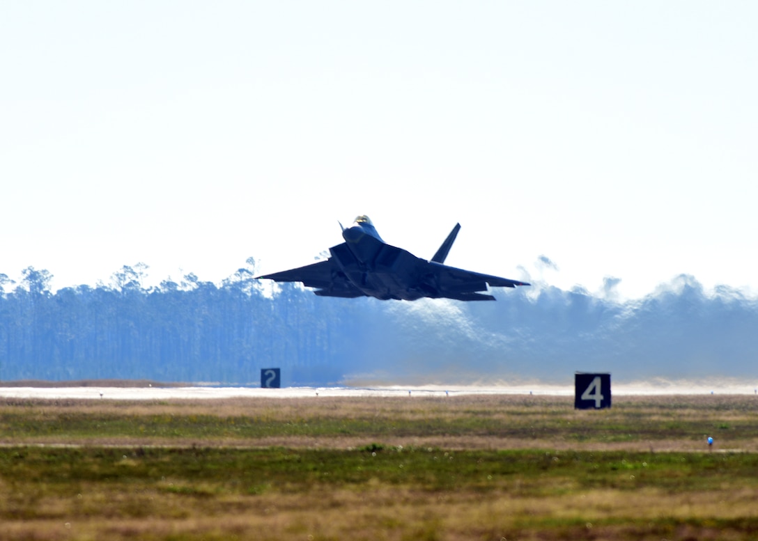 A U.S. Air Force F-22 Raptor from the 325th Fighter Wing flies down the runway at Tyndall Air Force Base, Fla., Nov. 16, 2018. Task Force Raptor, designed to help Tyndall AFB recover and rebuild, had one mission; fix and fly all F-22 Raptors from Tyndall AFB. (U.S. Air Force photo by Senior Airman Isaiah J. Soliz)