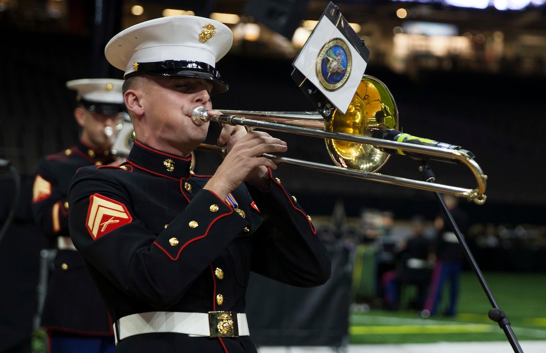Cpl. Cameron Street, a musician with the Marine Forces Reserve Band, plays the trombone during the 243rd annual Marine Corps birthday ball at the Mercedes-Benz Superdome, New Orleans, on Nov. 16, 2018. Every year, a birthday ball is hosted celebrating the birthday and traditions of the Marine Corps. (U.S. Marine Corps photo by Lance Cpl. Tessa D. Watts)
