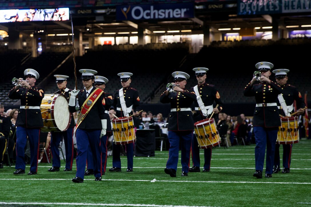 Marines with the Marine Forces Reserve Band perform “French Foreign Legion” during the 243rd annual Marine Corps birthday ball at the Mercedes-Benz Superdome, New Orleans, on Nov. 16, 2018. Every year, a birthday ball is hosted celebrating the birthday and traditions of the Marine Corps. (U.S. Marine Corps photo by Lance Cpl. Tessa D. Watts)