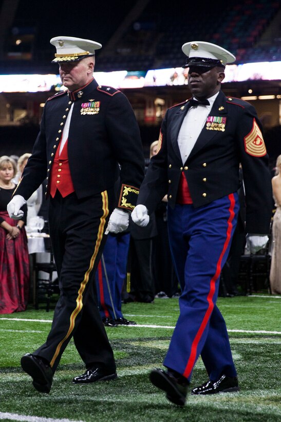 Brig. Gen. Bradley S. James, left, commander of Marine Forces Reserve and Marine Forces North, and Sgt. Maj. Ronald L. Green, sergeant major of the Marine Corps, are escorted onto the field during the 243rd annual Marine Corps birthday ball at the Mercedes-Benz Superdome, New Orleans, on Nov. 16, 2018. Every year, a birthday ball is hosted celebrating the birthday and traditions of the Marine Corps. (U.S. Marine Corps photo by Lance Cpl. Tessa D. Watts)Brig. Gen. Bradley S. James, left, commander of Marine Forces Reserve and Marine Forces North, and Sgt. Maj. Ronald L. Green, sergeant major of the Marine Corps, are escorted onto the field during the 243rd annual Marine Corps birthday ball at the Mercedes-Benz Superdome, New Orleans, on Nov. 16, 2018. Every year, a birthday ball is hosted celebrating the birthday and traditions of the Marine Corps. (U.S. Marine Corps photo by Lance Cpl. Tessa D. Watts)