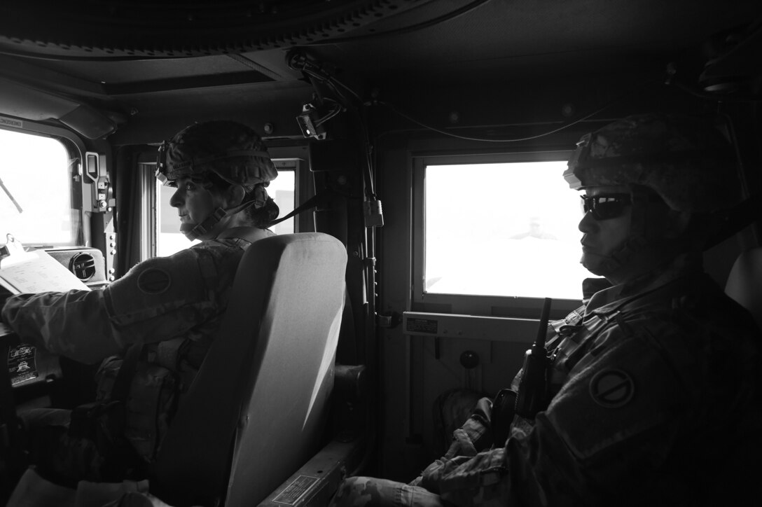 U.S. Army Reserve Brig. Gen. Kris A. Belanger, left, commanding general of the 85th United States Army Reserve Support Command, prepares for driver’s training during the 2-360th Training Support Battalion’s weekend battle assembly training at Parks Reserve Forces Training Area, Nov. 16, 2018.