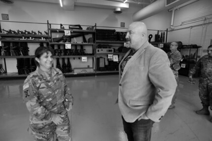 Brig. Gen. Kris A. Belanger, commanding general of the 85th United States Army Reserve Support Command, meets with Scott Mitten, who oversees the TADS (training aids, devices and simulators) warehouse at Parks Reserve Forces Training Area, Nov. 16, 2018.