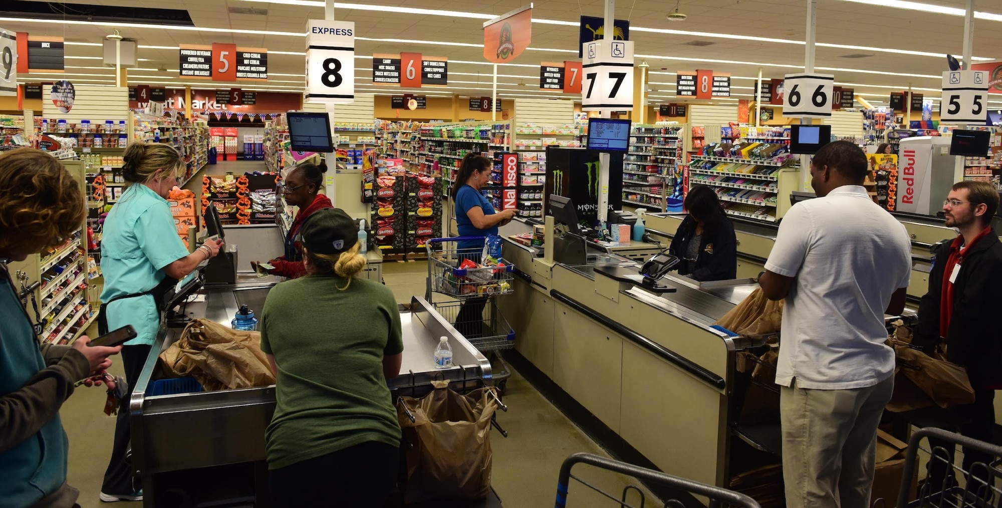 Tyndall Commissary employees check-out customers Nov. 19, 2018, at Tyndall Air Force Base, Fla. Several customer-service organizations reopened Nov. 17 for DOD ID cardholders to utilize. Many services on Tyndall were temporarily shut down due to the damage from Hurricane Michael. (U.S. Air Force photo by Senior Airman Cody R. Miller)