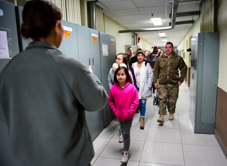 Families of 694th Air and Space Operations Center tour the AOC facilities and Korean Combined Operations and Intelligence Center on Osan Air Base, Nov. 16, 2018.