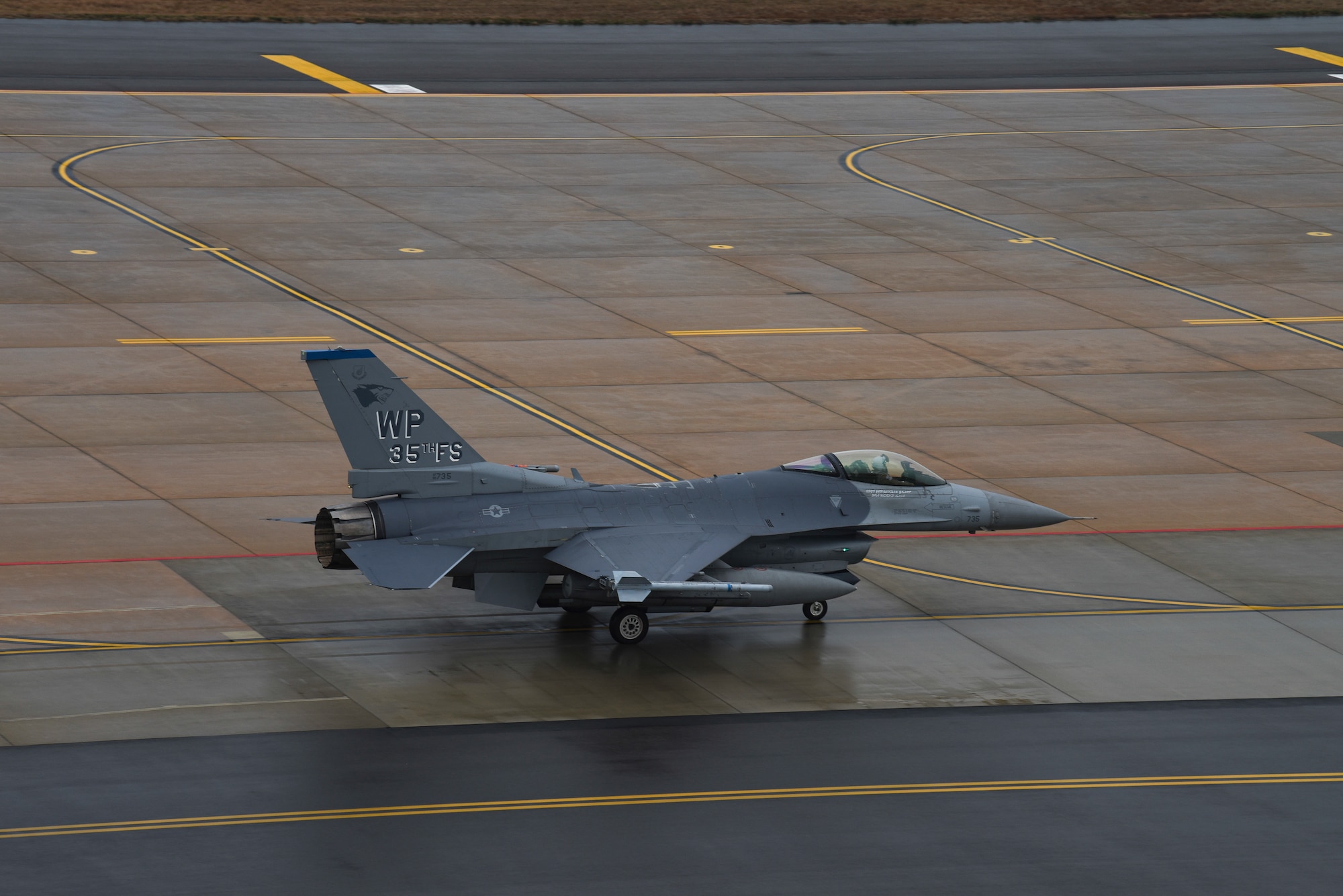 A U.S. Air Force F-16 Fighting Falcon, assigned to the 35th Fighter Squadron, taxis on the runway at Kunsan Air Base, Republic of Korea, after returning from Buddy Squadron 18-3 in Daegu, Republic of Korea, Nov. 8, 2018. U.S. Air Force F-16 Fighting Falcon pilots from the 8th Fighter Wing and Republic of Korea Air Force F-15K Slam Eagle pilots from the 122nd Fighter Squadron trained to improve interoperability and tactical effectiveness, while fostering cultural relations to ensure a strong alliance. (U.S. Air Force photo by Senior Airman Savannah L. Waters)