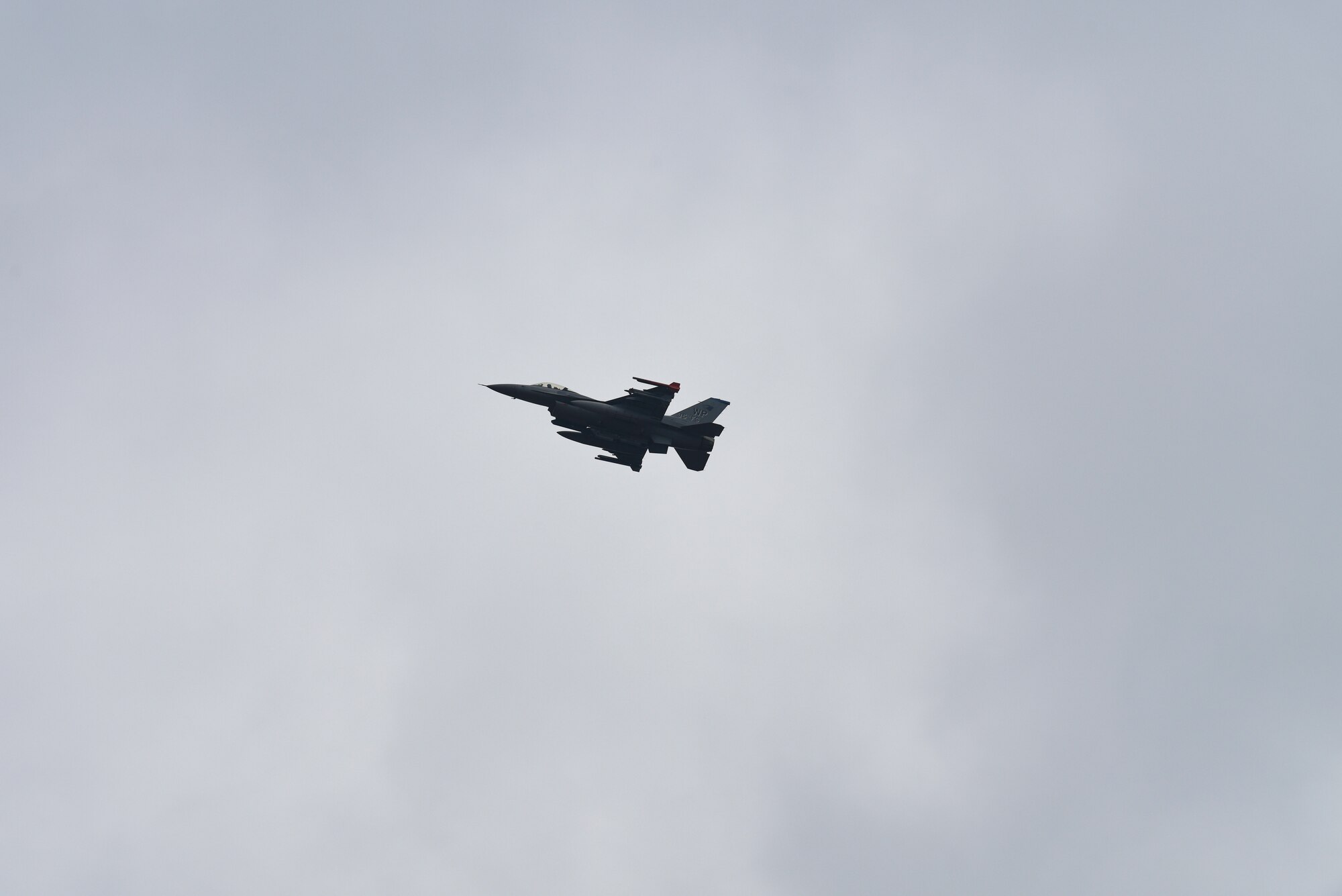 A U.S. Air Force F-16 Fighting Falcon, assigned to the 35th Fighter Squadron, flies over Kunsan Air Base, Republic of Korea, after returning from Buddy Squadron 18-3, Nov. 8, 2018. The Buddy Squadron program is designed to bring USAF and ROKAF units together to improve mission focus in a joint environment, giving participants a chance to introduce and review tactics, as well as exchange ideas. (U.S. Air Force photo by Senior Airman Savannah L. Waters)