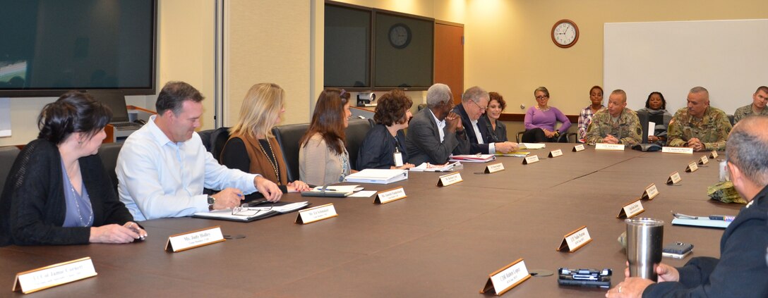 Members of the Council on Occupational Education evaluation team meet with leadership and staff from the Medical Education and Training Campus at Joint Base San Antonio-Fort Sam Houston during the accreditation evaluation site visit in-brief.