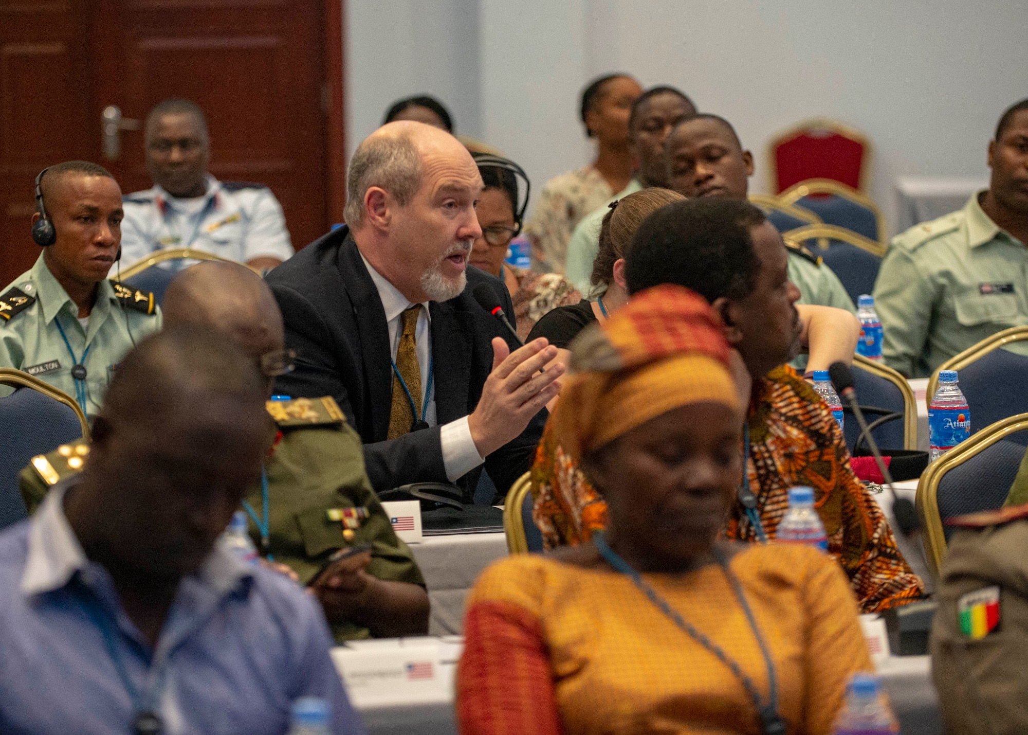 Chris Daniel, senior advisor for Global Health Engagement, asks a question during an African Partner Outbreak Response Alliance (APORA) conference in Monrovia, Liberia. During APORA, military and civilian leaders will work together to align best practices and improve response capabilities for potential outbreaks of contagious diseases. The training will help bolster relationships with current partners, and mobilize new partners to strengthen pandemic programs. (U.S. Navy photo by Mass Communication Specialist 2nd Class Robert J. Baldock)