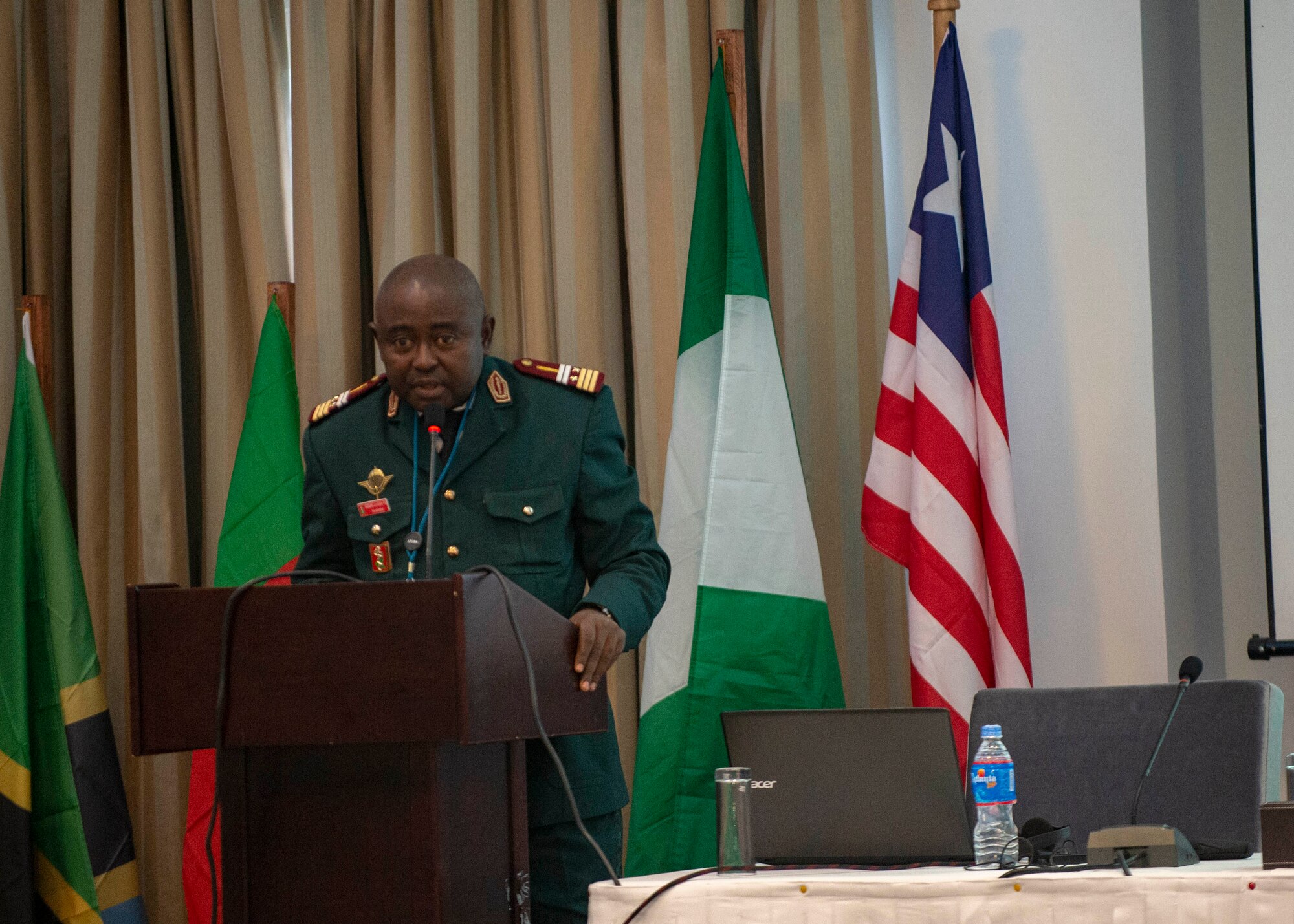 Lieutenant Colonel Julius Nwobegahay, Cameroonian Armed Forces, gives a presentation during an African Partner Outbreak Response Alliance (APORA) conference in Monrovia, Liberia. During APORA, military and civilian leaders will work together to align best practices and improve response capabilities for potential outbreaks of contagious diseases. The training will help bolster relationships with current partners, and mobilize new partners to strengthen pandemic programs. (U.S. Navy photo by Mass Communication Specialist 2nd Class Robert J. Baldock)