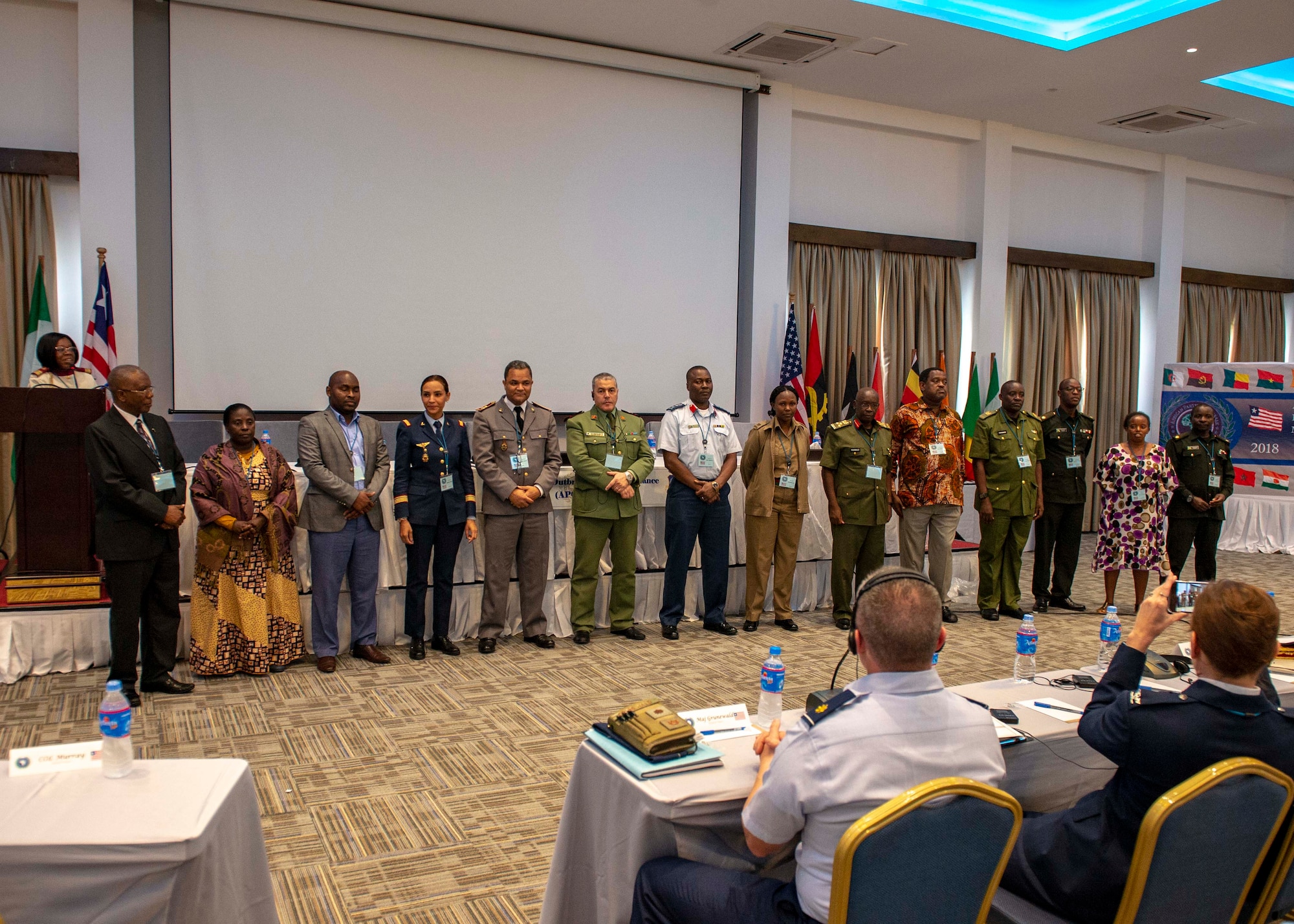 Delegates from African partner nations receive recognition for participating in an African Partner Outbreak Response Alliance (APORA) conference in Monrovia, Liberia. During APORA, military and civilian leaders will work together to align best practices and improve response capabilities for potential outbreaks of contagious diseases. The training will help bolster relationships with current partners, and mobilize new partners to strengthen pandemic programs. (U.S. Navy photo by Mass Communication Specialist 2nd Class Robert J. Baldock)