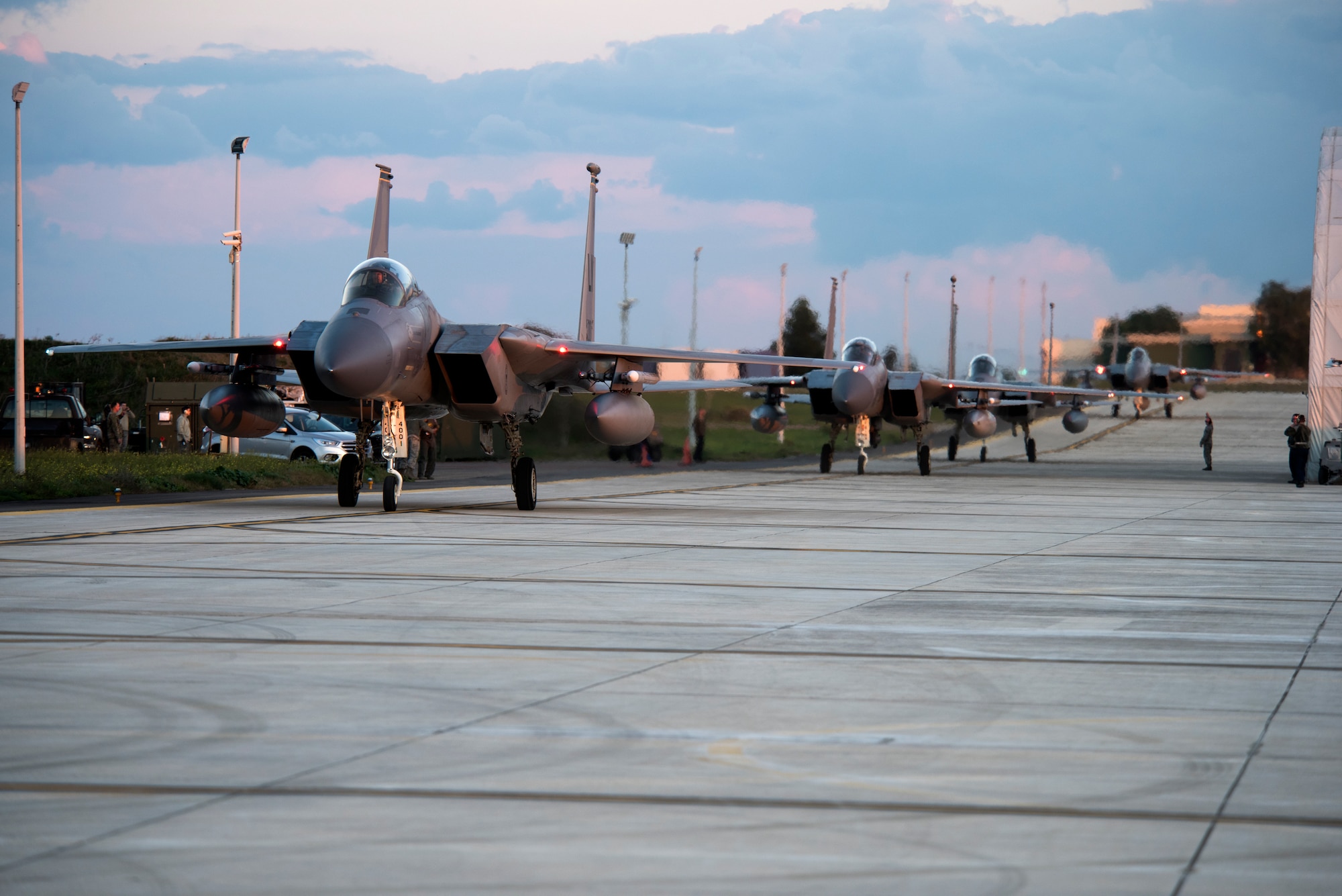 Four F-15C Eagles assigned to the 493rd Fighter Squadron taxi at Amendola Air Base, Italy, Nov. 16, 2018. F-15C Eagles and an F-15D Eagle will be participating in the NATO Tactical Leadership Programme 18-4. TLP has prepared hundreds of NATO and allied forces’ flight leaders to be mission commanders. (U.S. Air Force photo/ Senior Airman Malcolm Mayfield)