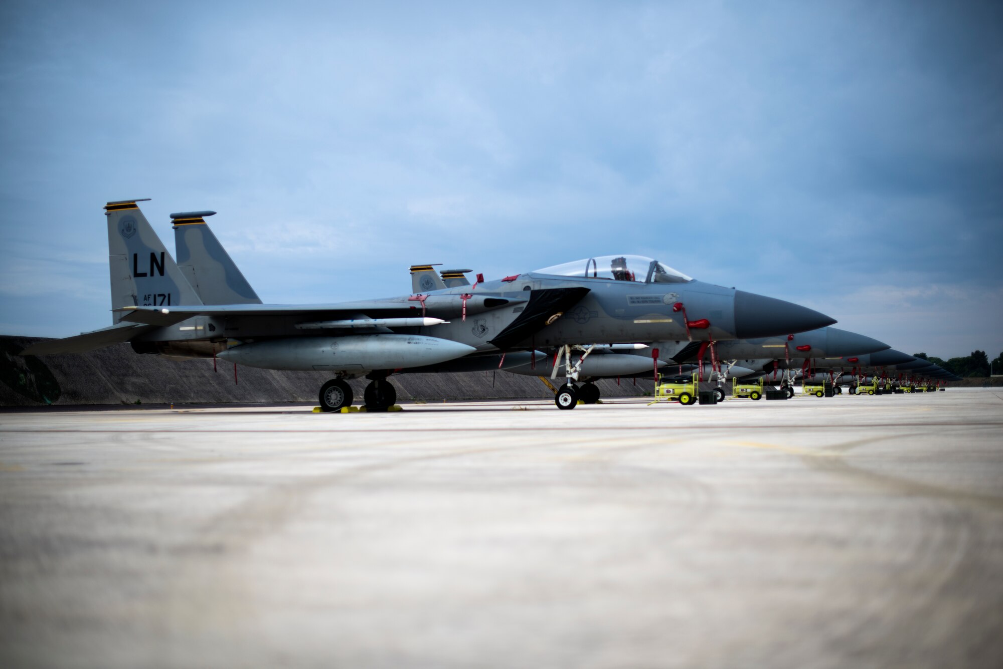 F-15C Eagles and an F-15D Eagle are parked on the flightline at Amendola Air Base, Italy, Nov. 19, 2018. F-15C Eagles and an F-15D Eagle will be participating in the NATO Tactical Leadership Programme 18-4. TLP has prepared hundreds of NATO and allied forces’ flight leaders to be mission commanders. (U.S. Air Force photo/ Senior Airman Malcolm Mayfield)