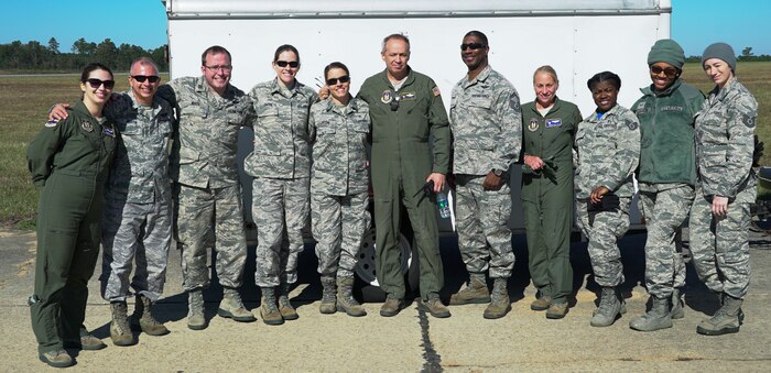 Reserve Citizen Airmen from the 315th Aeromedical Evacuation Squadron and 317th Airlift Squadron pose for a group photo during an operational readiness exercise at North Auxiliary Airfield, S.C., Nov. 17, 2018. The exercise provided the 315th Operations Group with hands-on training in a variety of airlift and aeromedical evacuation tactics during simulated combat events. (U.S. Air Force photo by Staff Sgt. Andrew Fox)