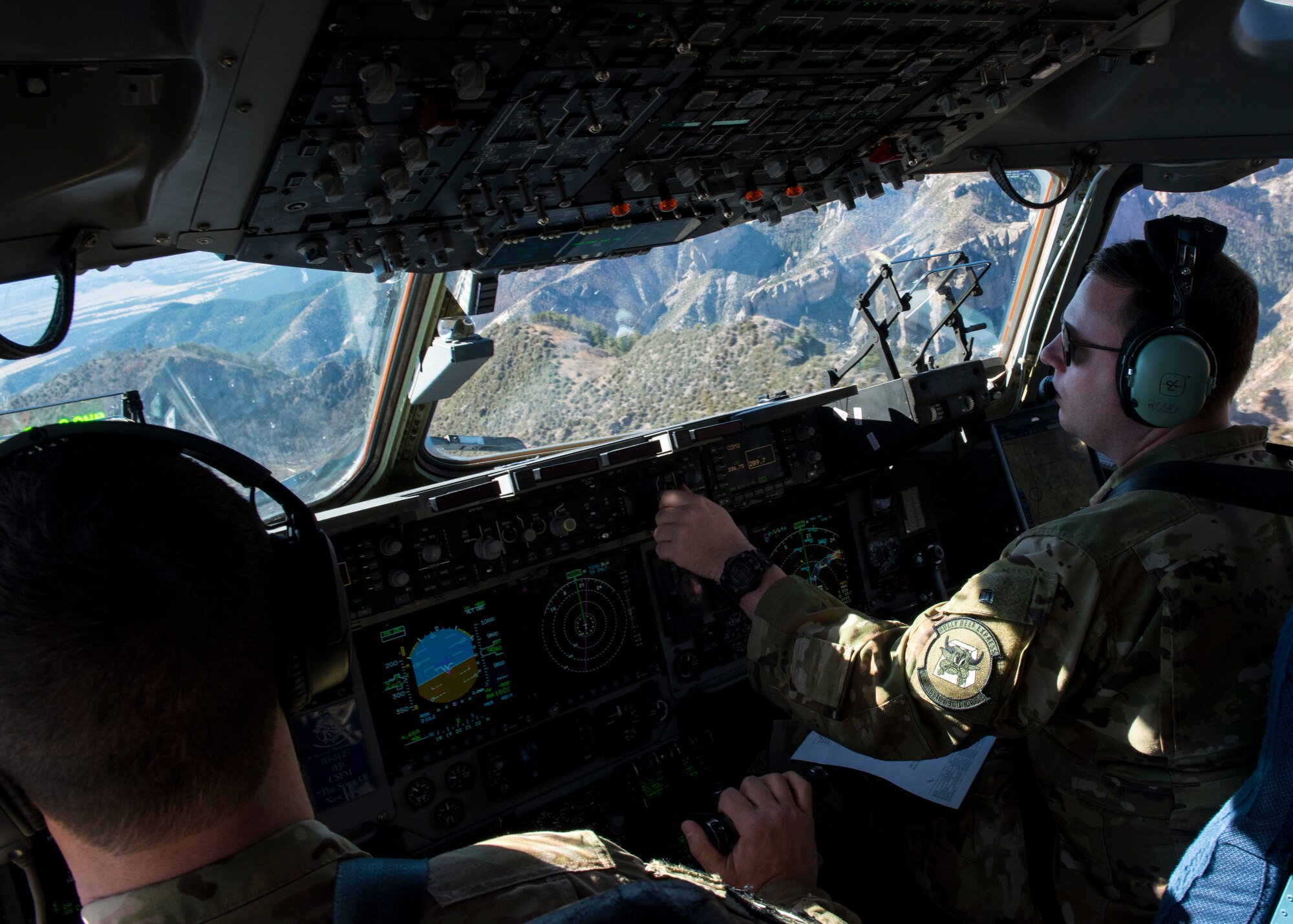 Pilots assigned to the 6th Airlift Squadron, Joint Base McGuire-Dix-Lakehurst, N.J., fly a C-17 Globemaster III cargo aircraft during Exercise JERSEY WRATH 19-1 over Arizona Nov. 13, 2018. The mobility-centric training exercise highlighted integration between mobility and combat assets in a realistic training scenario. (U.S. Air Force photo by Airman 1st Class Jacob Wongwai)