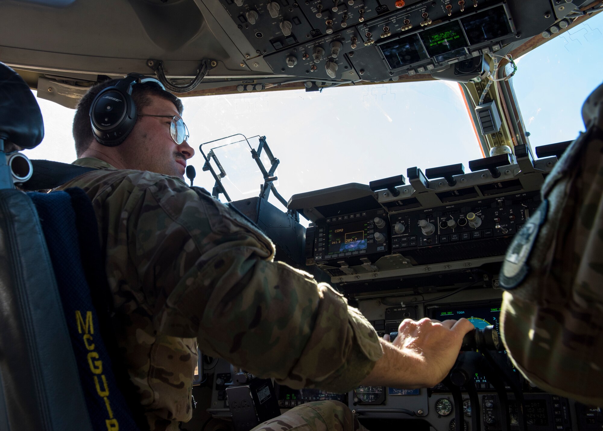 A pilot assigned to the 6th Airlift Squadron, Joint Base McGuire-Dix-Lakehurst, N.J., prepares to take-off in a C-17 Globemaster III cargo aircraft during Exercise JERSEY WRATH 19-1 in Mesa, Ariz., Nov. 13, 2018. The exercise provided an opportunity for numerous military bases to work together by providing a realistic training scenario which highlighted integration between mobility and combat assets. (U.S. Air Force photo by Airman 1st Class Jacob Wongwai)