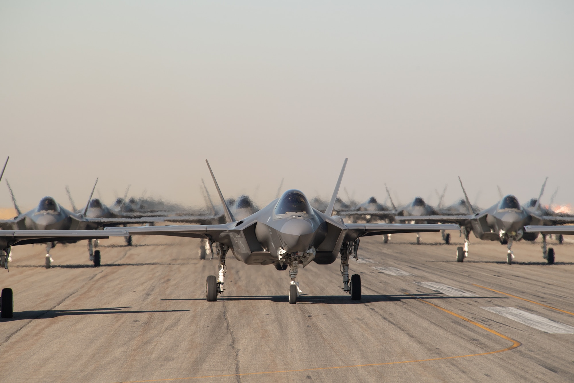 F-35A pilots from the 388th and 419th Fighter Wing prepare for takeoff as part of a combat power exercise at Hill Air Force Base, Utah. The exercise aims to confirm their ability to quickly employ a large force of jets against air and ground targets, and demonstrate the readiness and lethality of the F-35 Lightning II. As the first combat-ready F-35 units in the Air Force, the 388th and 419th FWs are ready to deploy anywhere in the world at a moment’s notice. (United States Air Force photo/Cynthia Griggs)