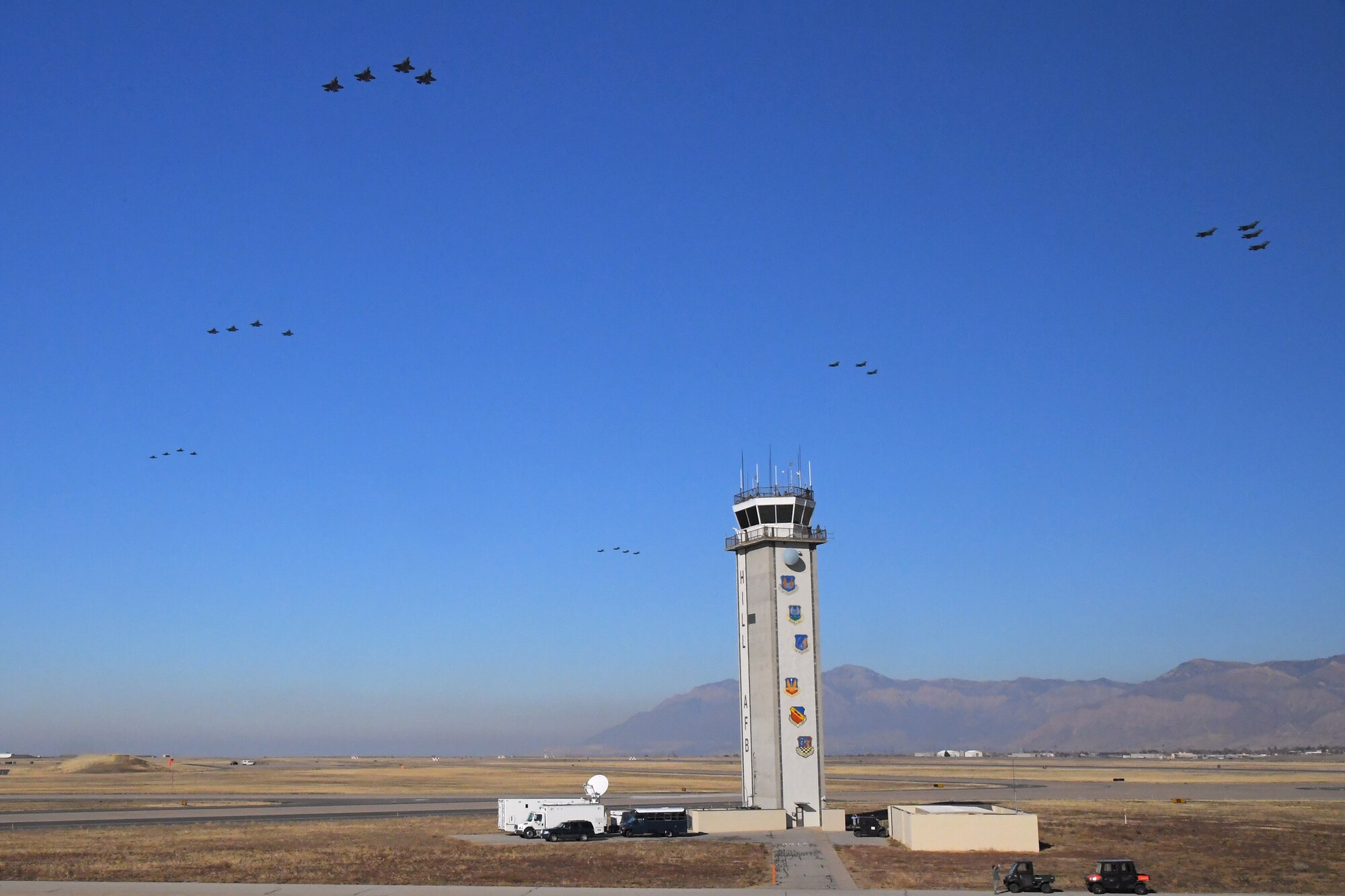 F-35A Lightning IIs from the 388th and 419th Fighter Wing fly by in formation as part of a combat power exercise at Hill Air Force Base, Utah. The exercise aims to confirm their ability to quickly employ a large force of jets against air and ground targets, and demonstrate the readiness and lethality of the F-35 Lightning II. As the first combat-ready F-35 units in the Air Force, the 388th and 419th FWs are ready to deploy anywhere in the world at a moment’s notice. (United States Air Force photo/Todd Cromar)