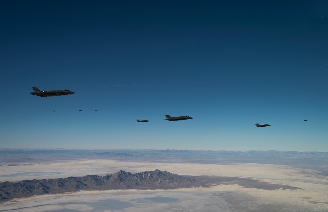 A formation of 35 F-35A Lightning IIs, from the 388th and 419th Fighter Wings fly over the Utah Test and Training Range as part of a combat power exercise on Nov. 19, 2018. The exercise aims to confirm their ability to quickly employ a large force of jets against air and ground targets, and demonstrate the readiness and lethality of the F-35. As the first combat-ready F-35 units in the Air Force, the 388th and 419th FW at Hill Air Force Base, Utah, are ready to deploy anywhere in the world at a moment's notice. (U.S. Air Force photo by Staff Sgt. Andrew Lee)