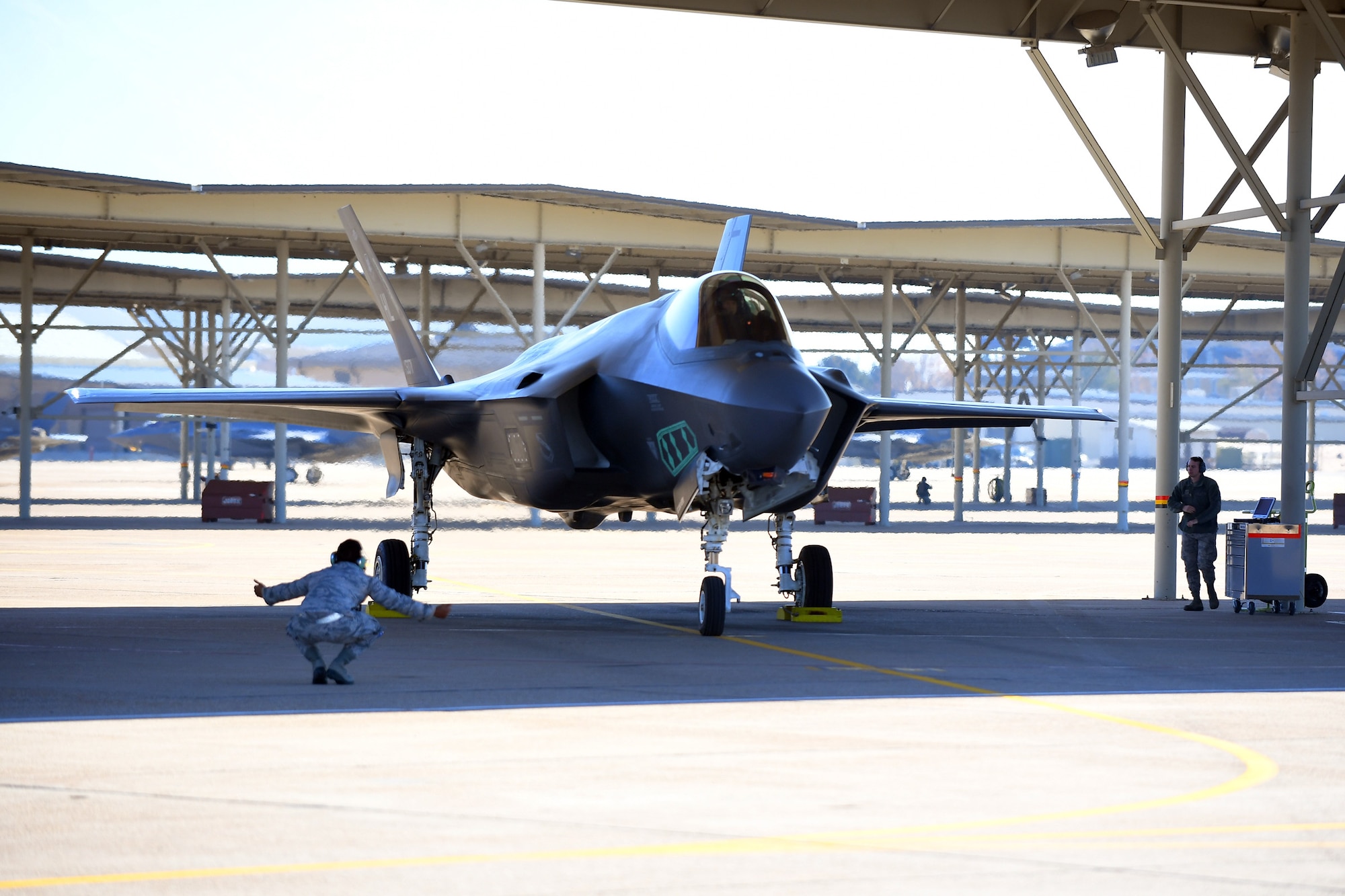 Maintainers from the 388th Maintenance Group prepare an F-35A for its mission Nov. 19. Pilots and maintainers from the 388th and 419th conducted a combat power exercise at Hill Air Force Base, Utah, Nov. 19. The exercise aims to confirm their ability to quickly employ a large force of jets against air and ground targets, and demonstrate the readiness and lethality of the F-35 Lightning II. As the first combat-ready F-35 units in the Air Force, the 388th and 419th FWs are ready to deploy anywhere in the world at a moment’s notice. (United States Air Force photo/Todd Cromar)