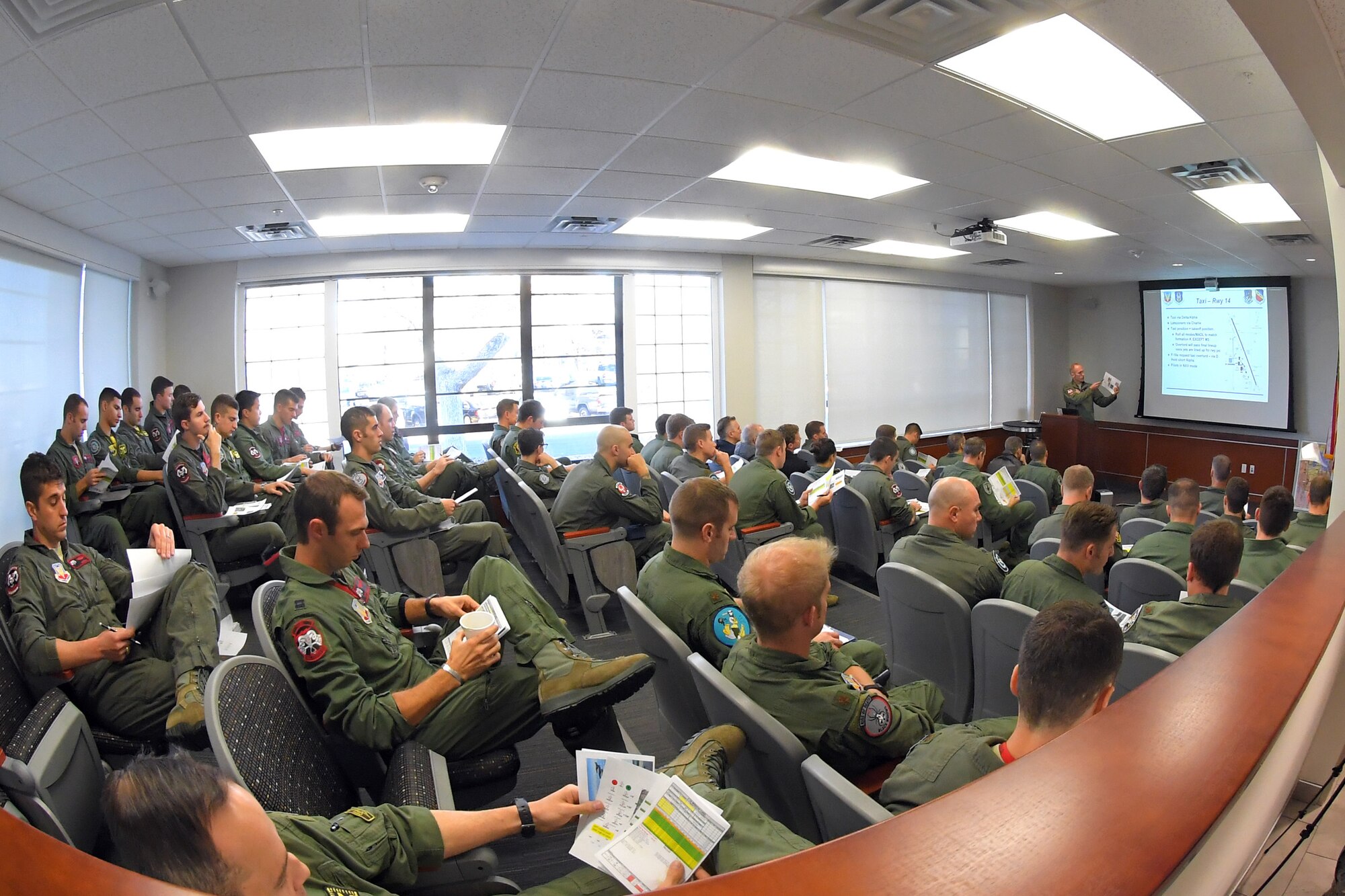 F-35A pilots from the 388th and 419th Fighter Wing go through their mission brief as they prepare for a combat power exercise at Hill Air Force Base, Utah. The exercise aims to confirm their ability to quickly employ a large force of jets against air and ground targets, and demonstrate the readiness and lethality of the F-35 Lightning II. As the first combat-ready F-35 units in the Air Force, the 388th and 419th FWs are ready to deploy anywhere in the world at a moment’s notice. (United States Air Force photo/Todd Cromar)