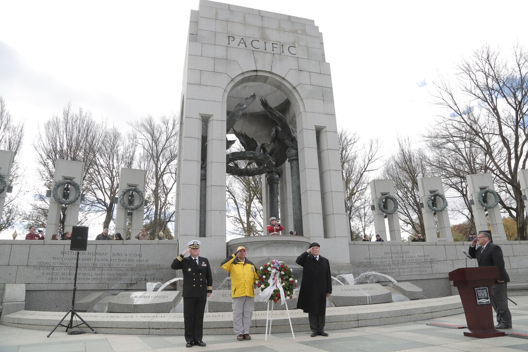 On Nov. 20, 2018 a trumpet player from "The President's Own" U.S. Marine Band performed for the ceremony and wreath presentation at the World War II Memorial’s Pacific Arch to mark the 75th anniversary of the Battle of Tarawa. The 1943 U.S. amphibious landing at the heavily fortified, Japanese-held island of Betio in the Tarawa Atoll in the Gilbert Islands was “the toughest battle in Marine Corps history” according to onecombat correspondent. (U.S. Marine Corps photo by Master Sgt. Kristin duBois/released)