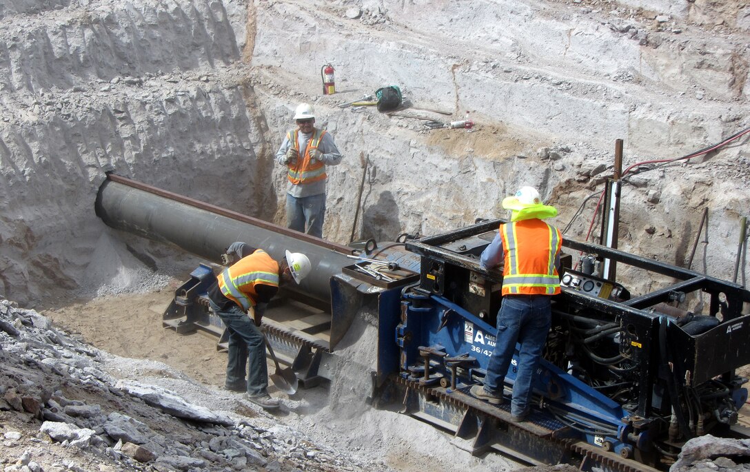 SANTA FE, N.M. – Workers bore under a road for a new water line north of Santa Fe, Oct. 1, 2018. Photo by Richard Banker. This 2018 photo drive entry was selected by Albuquerque District commander Lt. Col. Larry Caswell as the Commander's Choice winner. This award is based on the photo which best epitomizes the Corps' mission and is creative and artistically expressive.