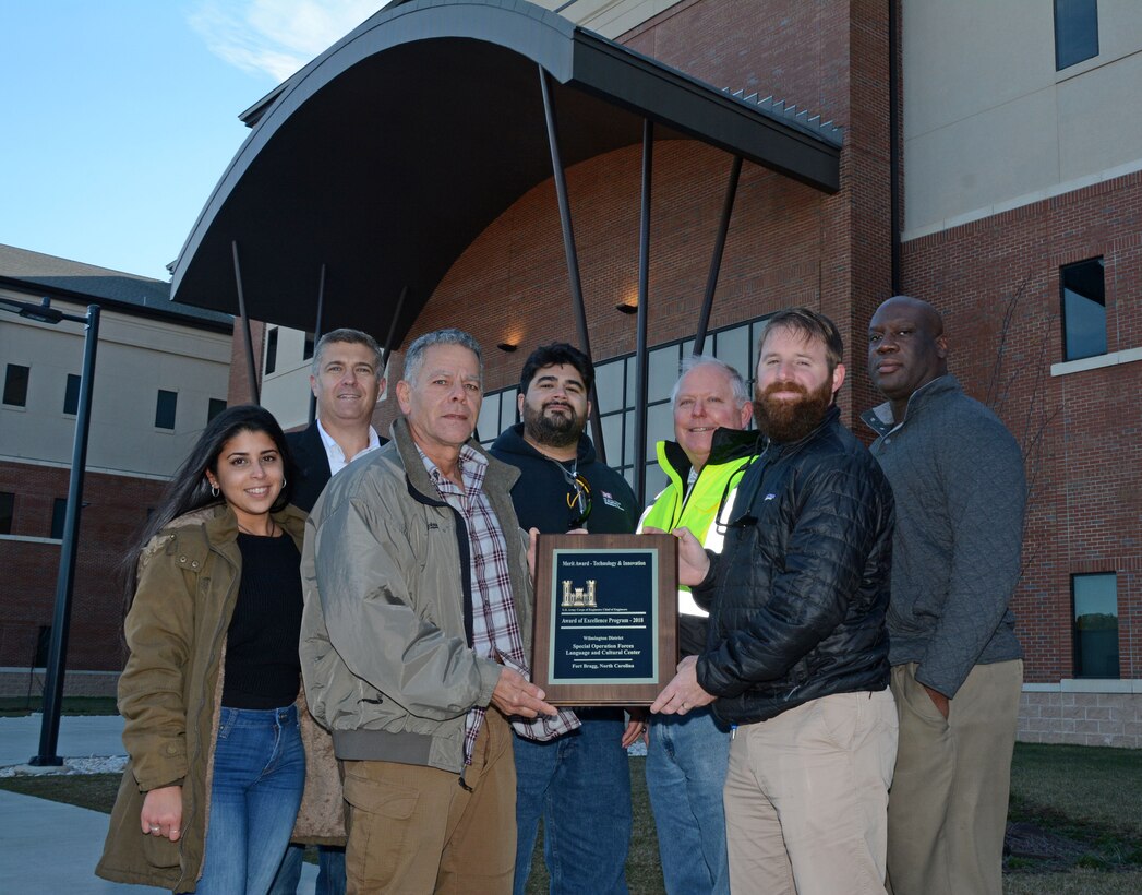 Congratulations to the District's Fort Bragg Special Operations Command Resident Engineer Office for winning a Merit Award for Technology and Innovation from U.S. Army Corps of Engineers Headquarters in Washington for construction management and design of the Language and Culture Center.  From left to right: Wilmarie Pagan-Sanchez, Ron Cannady, William Rodriguez, Juan Ramos, Doug Wood, Brian Whitley and Paul Blue.
