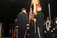 FORT KNOX, Ky. - Command Sgt. Maj. Jason Willett, senior enlisted advisor, 1st Theater Sustainment Command, conducts a Relinquishment of Responsibility as he passes the 1st Theater Sustainment Command guidon to Maj. Gen. Flem B. "Donnie" Walker, Jr., commanding general of 1st TSC, Oct.23. Willett dedicated 26 years to service in the Army, caring for the Army's greatest assets - its Soldiers. (U.S. Army photos by Spc. Zoran Raduka)