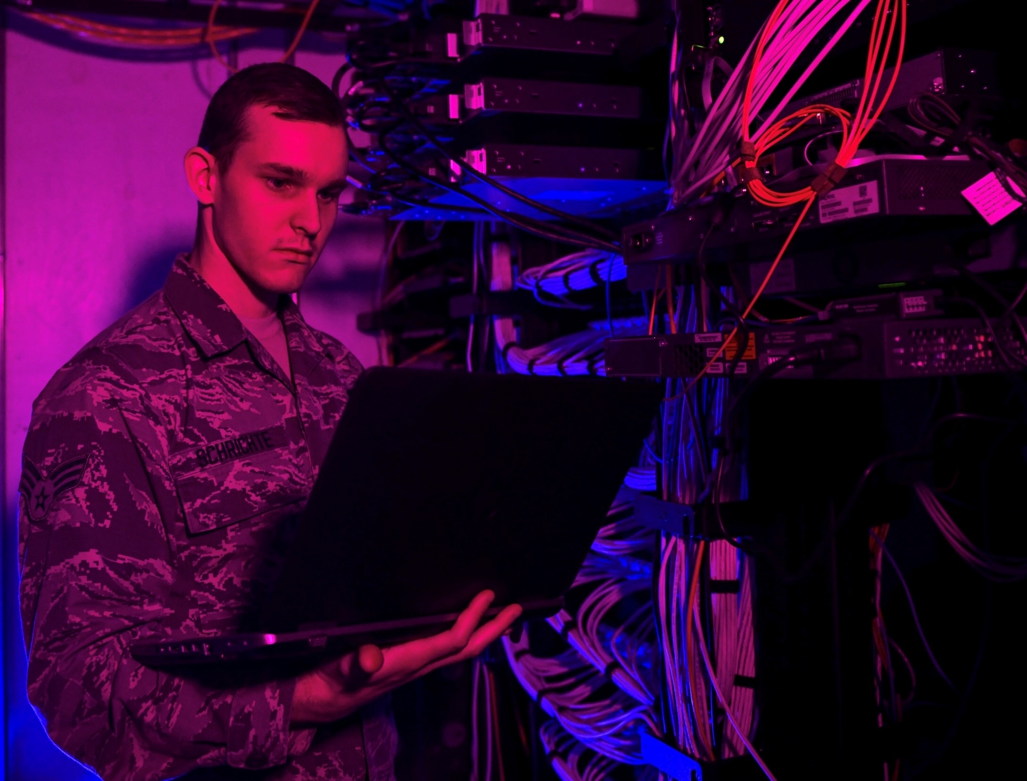 Senior Airman Alexander Schrichte, 460th Space Communications Squadron client systems technician, performs routine technical checks on network servers, Nov. 9, 2018 at Buckley Air Force Base, Colo. Buckley AFB was handpicked alongside of six other bases to pilot a new program called Network As A Service, or NAAS, which benchmarks the way cyber deterrence in the U.S. Air force is accomplished across the globe. Airmen belonging to the 460th Space Communication Squadron will no longer be limited to fixing technical issues, they will be defending our nation from cyber attacks.
(U.S. Air Force photo by Airman 1st Class Michael D. Mathews)