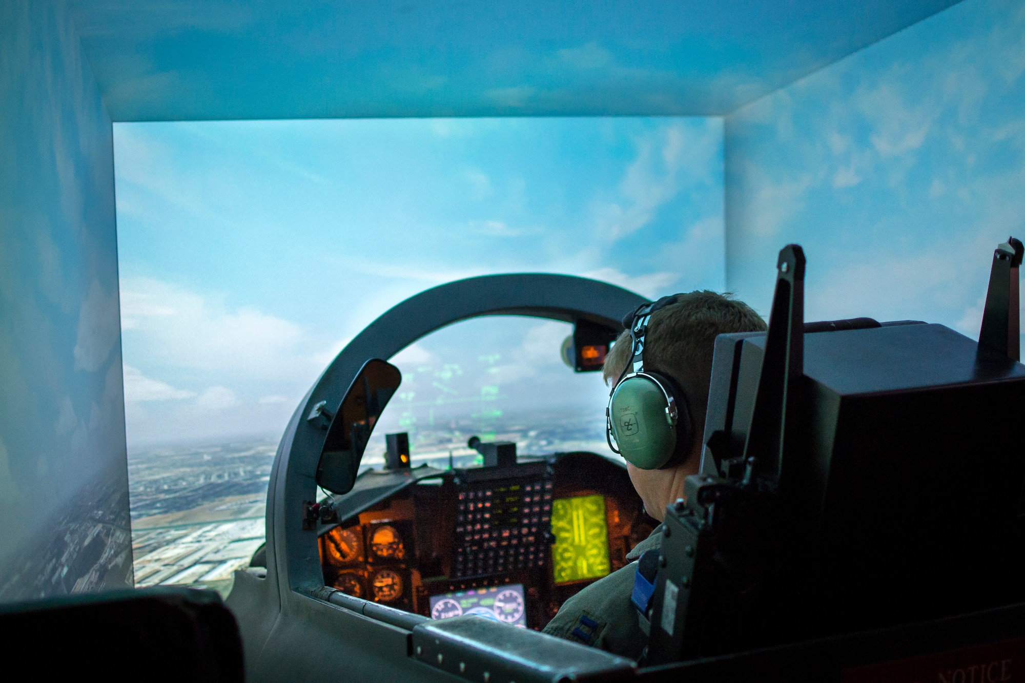 A U.S. Air Force student pilot checks instruments while flying in a T-38C Talon flight simulator on Nov. 8th at Joint Base San Antonio - Randolph. Simulators play a key role in Introduction to Fighter Fundamentals and pilot training.