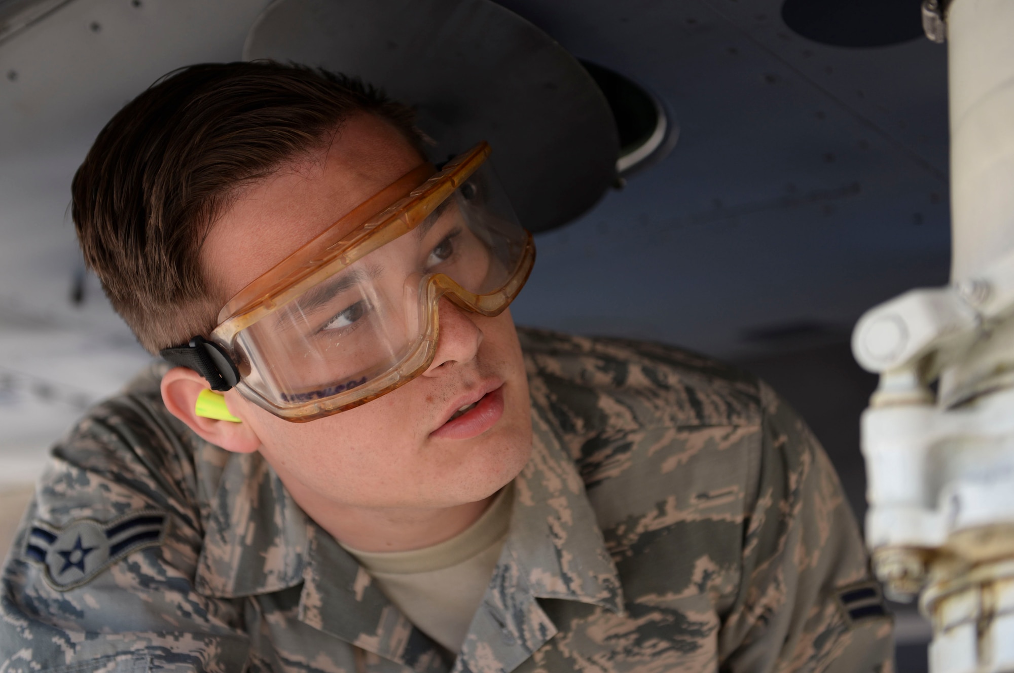 Airman 1st Class Liam Burke, 757th Aircraft Maintenance Squadron Strike Aircraft Maintenance Unit F-15E Strike Eagle fighter jet maintainer, inspects an F-15E prior to launching Nov. 15, 2018 at Nellis Air Force Base, Nevada. Maintainers inspect aircraft prior to flights to ensure safety. (U.S. Air Force photo by Airman Bailee A. Darbasie)