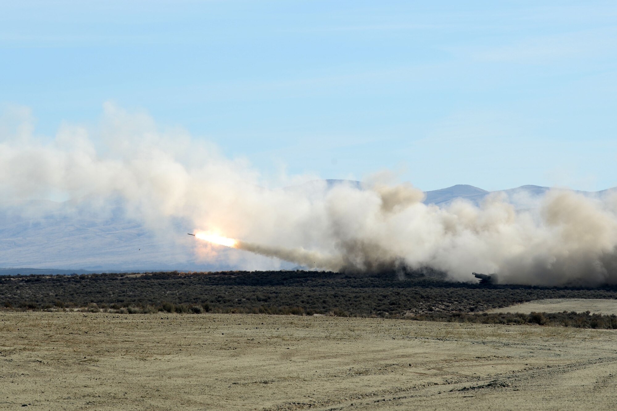 Rockets are launched from 17 Field Artillery Brigade High Mobility Artillery Rocket System (HIMARS) vehicles, November 15, 2018, at Yakima Training Center, Wash.