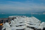 HONG KONG (Nov. 21, 2018) The aircraft carrier USS Ronald Reagan (CVN 76) pulls into Hong Kong, China. Ronald Reagan is forward-deployed to the U.S. 7th Fleet area of operations in support of security and stability in the Indo-Pacific region.
