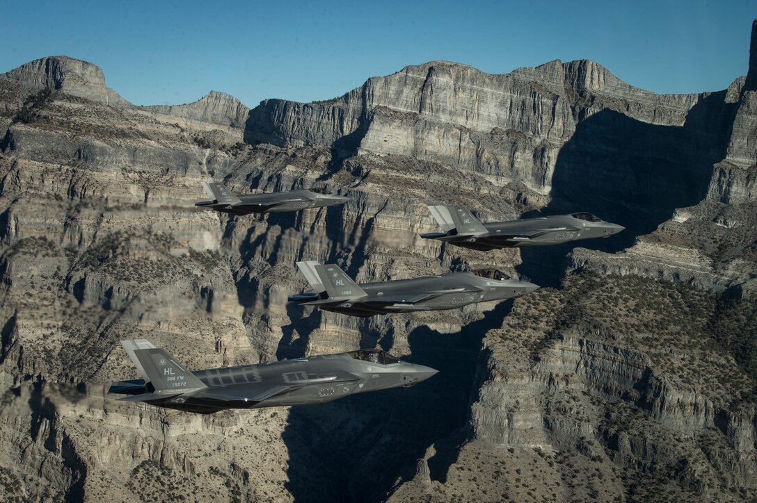 A formation of F-35 Lightning IIs from the 388th and 419th Fighter Wings stationed at Hill Air Force Base perform aerial maneuvers during as part of a combat power exercise over Utah Test and Training Range, Nov. 19, 2018. The exercise aims to confirm their ability to quickly employ a large force of jets against air and ground targets, and demonstrate the readiness and lethality of the F-35A. As the first combat-ready F-35 unit in the Air Force, the 388th and 419th FW are ready to deploy anywhere in the world at a moment’s notice.  (U.S. Air Force photo by Staff Sgt. Cory D. Payne)