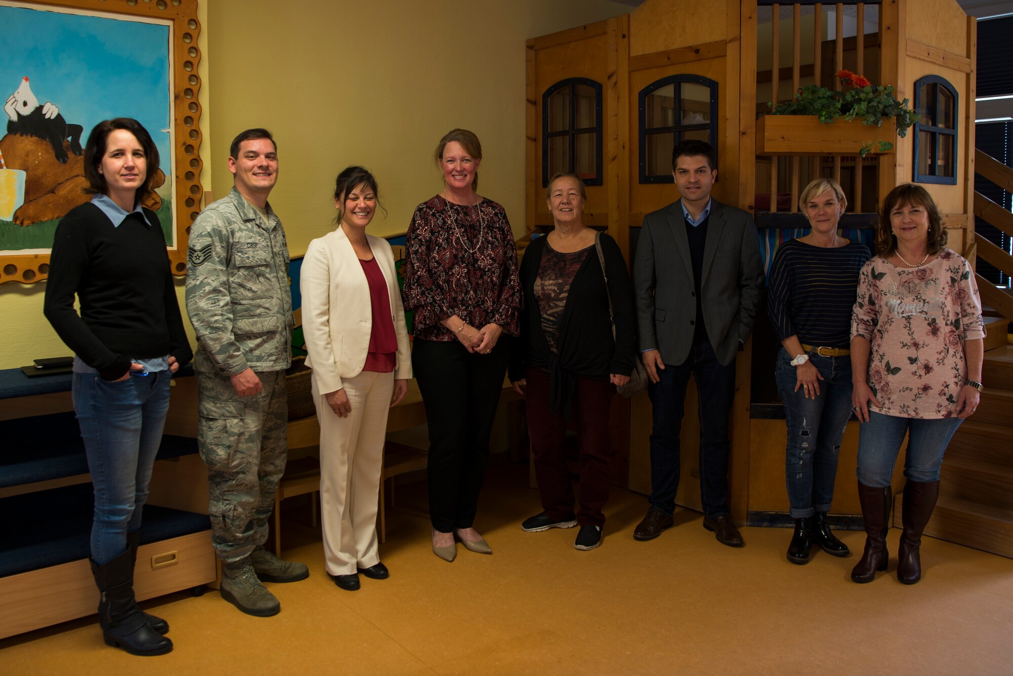 Members of the 86th Airlift Wing and members of the local German community stand for a photo during an 86th AW Host Nation grassroots program trip in Dansberg Germany, Nov. 20, 2018. The grassroots program partners military members and spouses with children in the local community to forge friendships and better American and German relations. (U.S. Air Force photo by Airman 1st Class Noah Coger)
