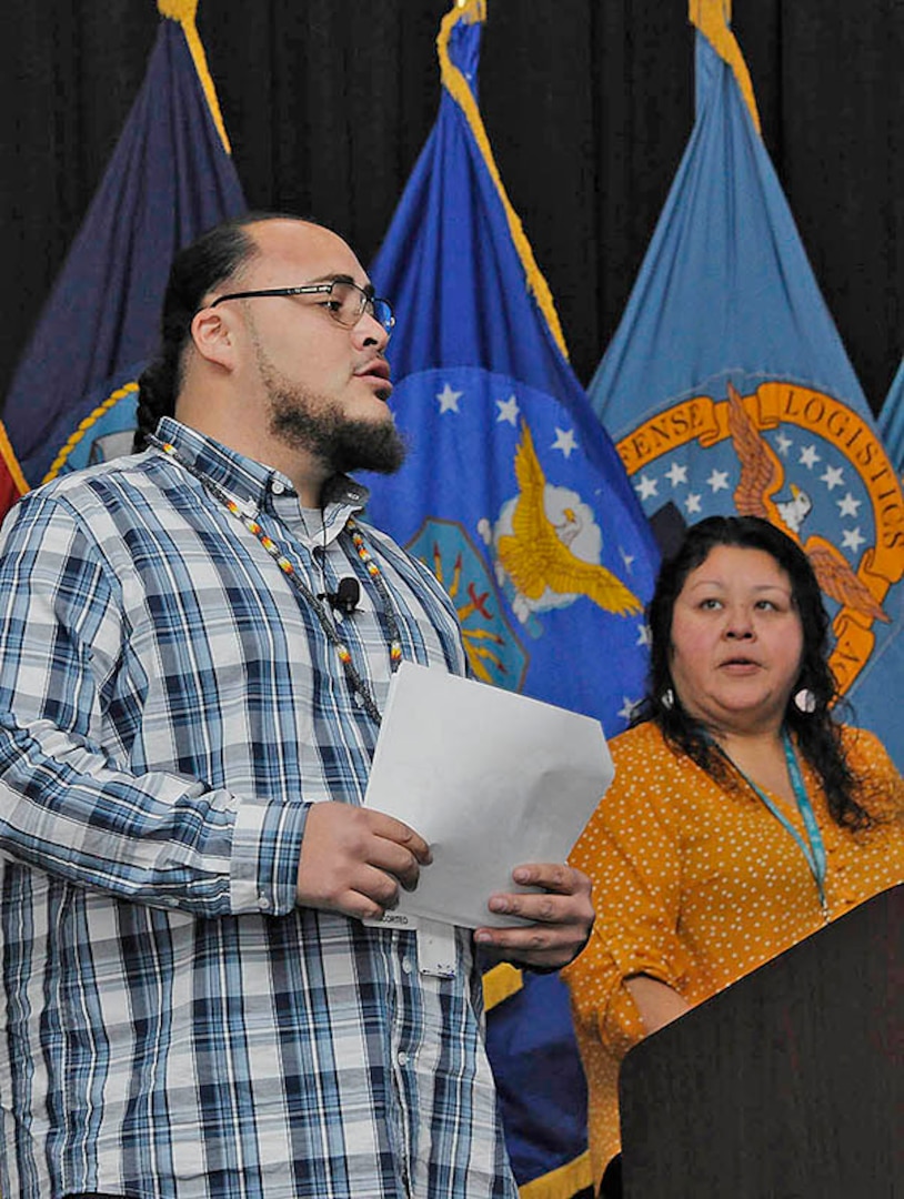 Pine Creek Indian Reservation Cultural Events Coordinator Danielle Pfeifer and Potawatomi Culture Specialist Kevin Harris II speak to DLA personnel during the Battle Creek site's Native American Heritage Month observation Nov. 8.