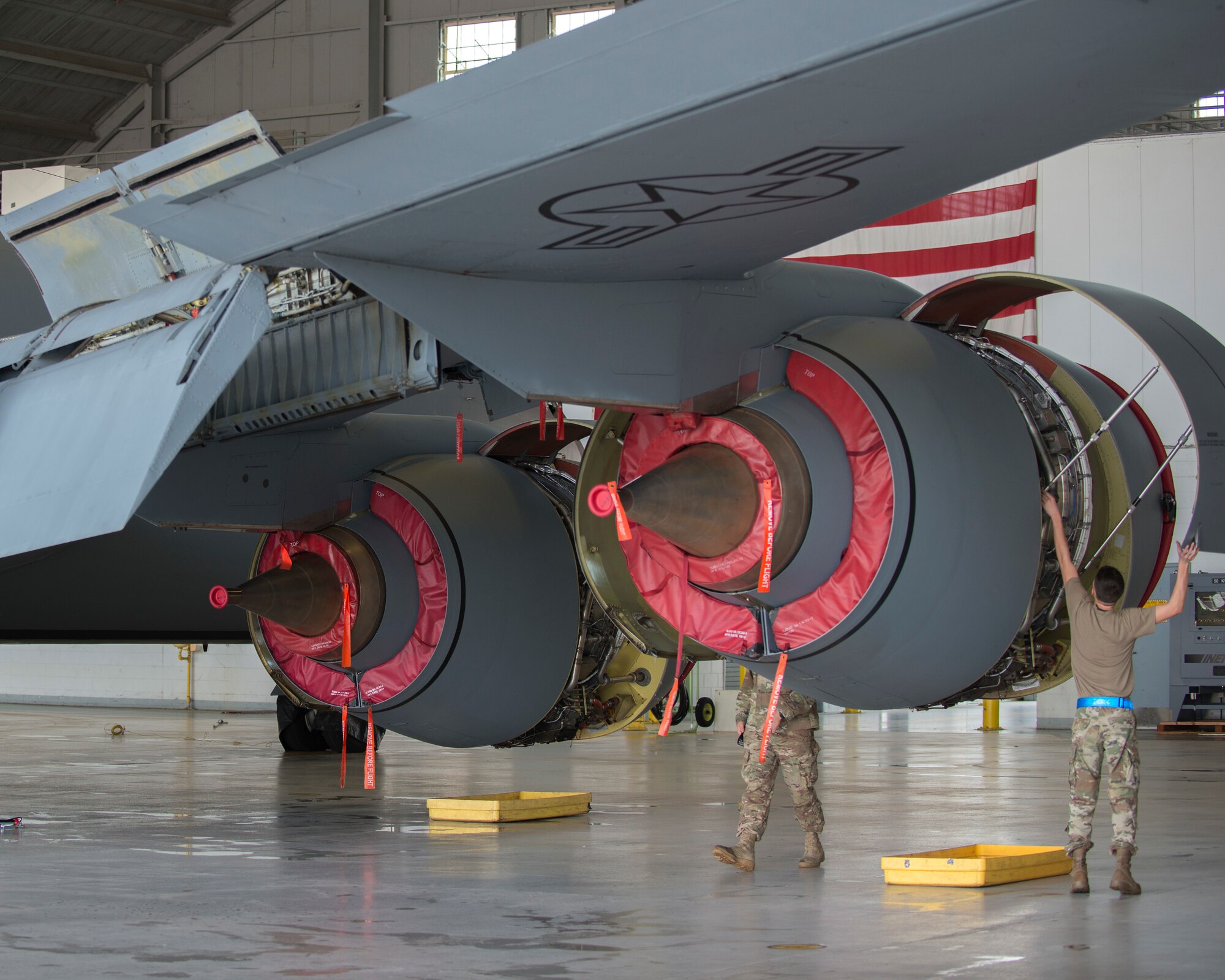 U.S. Air Force Airman 1st Class Caylor Jones, a communications and navigation apprentice assigned to the 6th Aircraft Maintenance Squadron, prepares to close a cowling on a KC-135 Stratotanker aircraft at MacDill Air Force Base, Fla., Nov. 19, 2018.