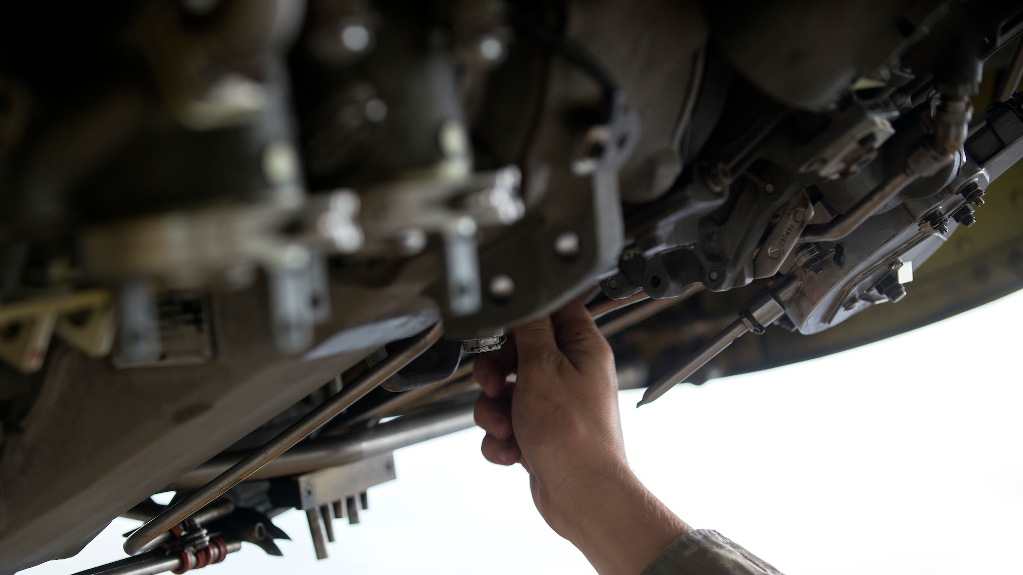 U.S. Air Force Staff Sgt. Joseph Libby, a 6th Aircraft Maintenance Squadron crew chief, inspects a KC-135 Stratotanker aircraft engine at MacDill Air Force Base, Fla., Nov. 19, 2018.