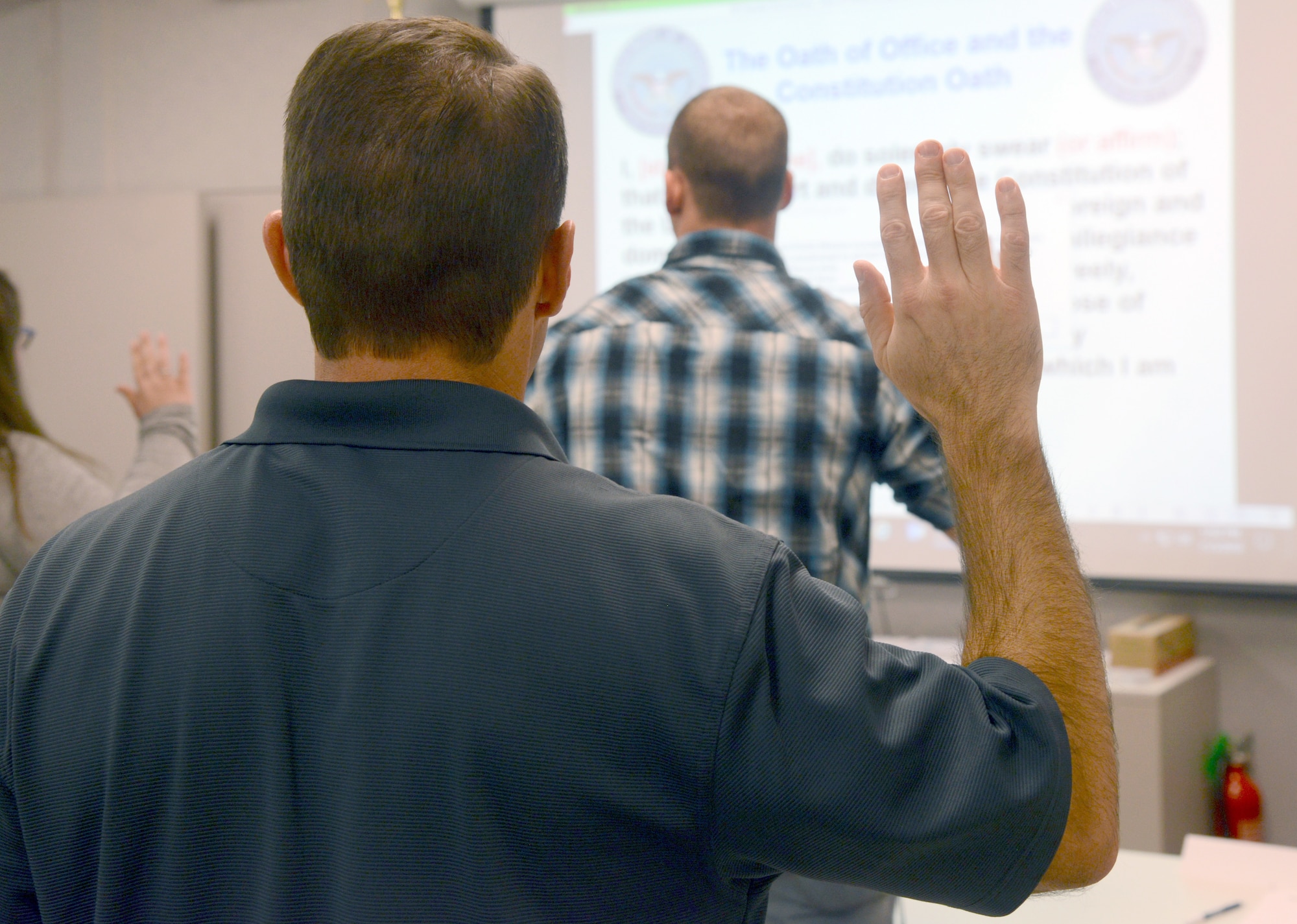 During newcomer orientation, new Department of Defense employees raise their right hand to support the Constitution of the United States. Not to be taken lightly, the oath is a public statement of commitment, pledging allegiance to the nation and binding that individual to see the mission succeed.