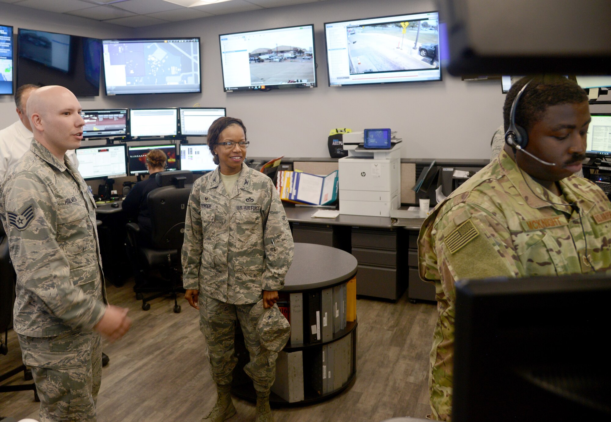 Staff Sgt. Rafe Holmes, 72nd Security Forces Squadron, guides Col. Yvonne Spencer through Tinker Air Force Base’s Emergency Communication Center during her visit Oct. 30-31. Spencer, Air Force Installation and Mission Support Center Det. 6 commander, met with 72nd Air Base Wing leadership and had breakout sessions and tours with organizations across the wing to gain insight into installation needs to better advocate for AFIMSC resources.