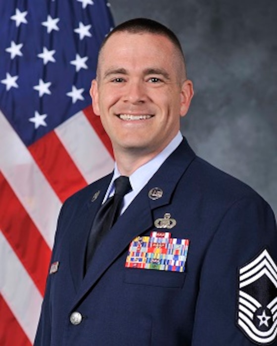 Chief Master Sergeant Daniel J. Kenemore is the Chief Enlisted Manager for the United States Air Force Band of Mid-America, Headquarters Air Mobility Command, Scott Air Force Base, Illinois. The band is composed of sixty-one personnel and five flights including operations, publicity, resources, readiness, and administrative support. Additionally, the band maintains thirteen performance teams that execute more than 400 missions each year in support of strategic Air Force messaging initiatives, Presidential support, civic outreach, international partnership building, recruiting, and troop support across a ten state region and at deployed locations around the world. Chief Kenemore is the principle advisor to the commander on good order and discipline, health and wellness, readiness, professional development, and training of the unit’s enlisted personnel.