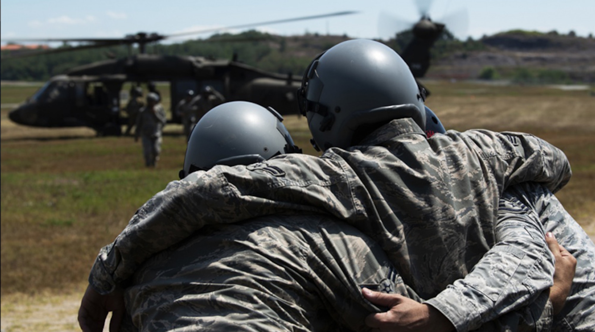 8th Fighter Wing Airmen help a simulated casualty move toward a UH-60 Blackhawk helicopter from U.S. Army Garrison Humphreys during personnel recovery training Aug. 15, 2018, at Kunsan Air Base, Republic of Korea. In this exercise, it is likely each participant would have used the Personnel Recovery Command and Control software system to upload their vital statistics prior to deployment. Program Executive Office Digital at Hanscom Air Force Base, Mass., supports and sustains that system using agile software development processes. (U.S. Air Force photo by Senior Airman Stefan Alvarez)