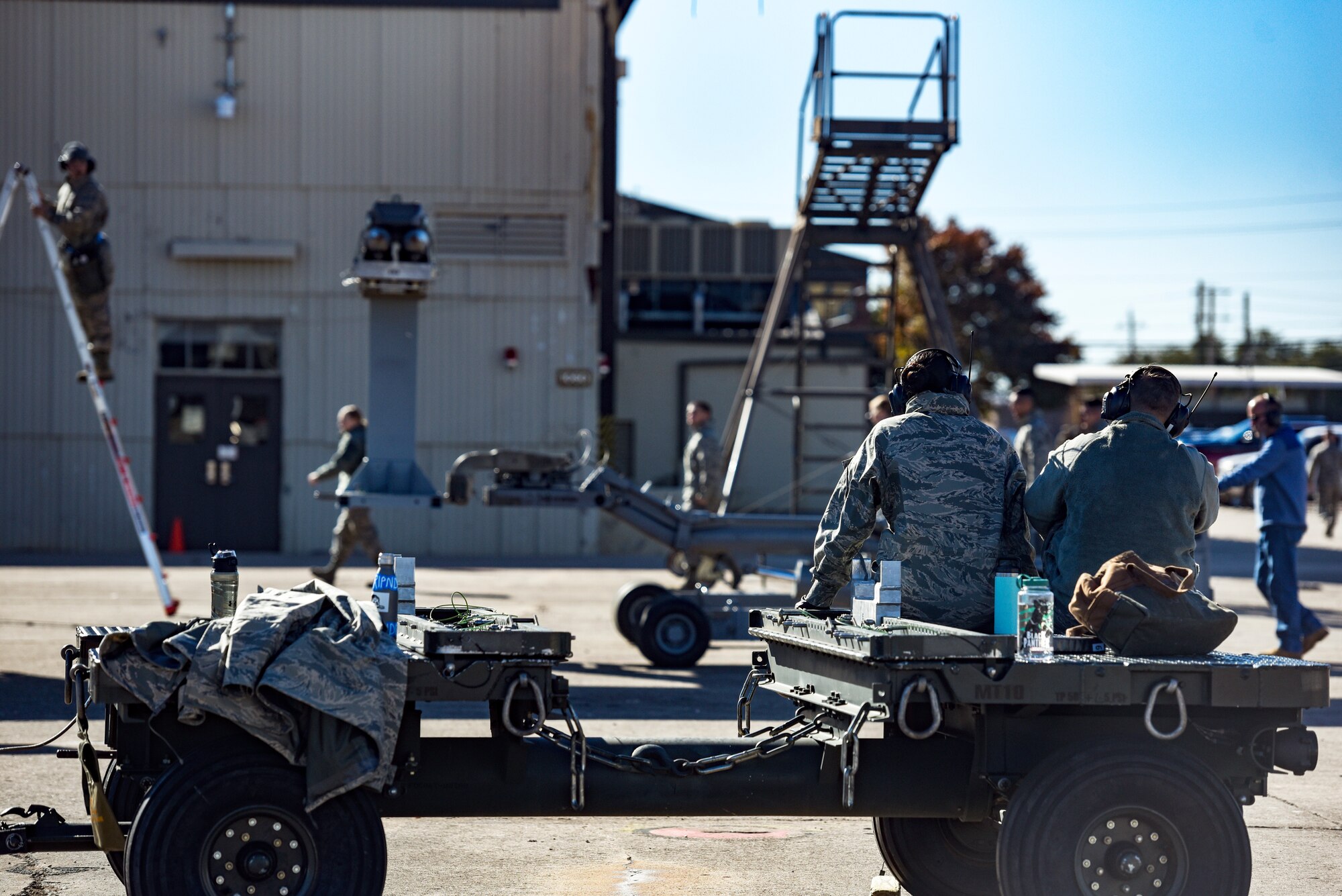 Sheppard Airmen in training work on a C-130 Hercules trainer jet.