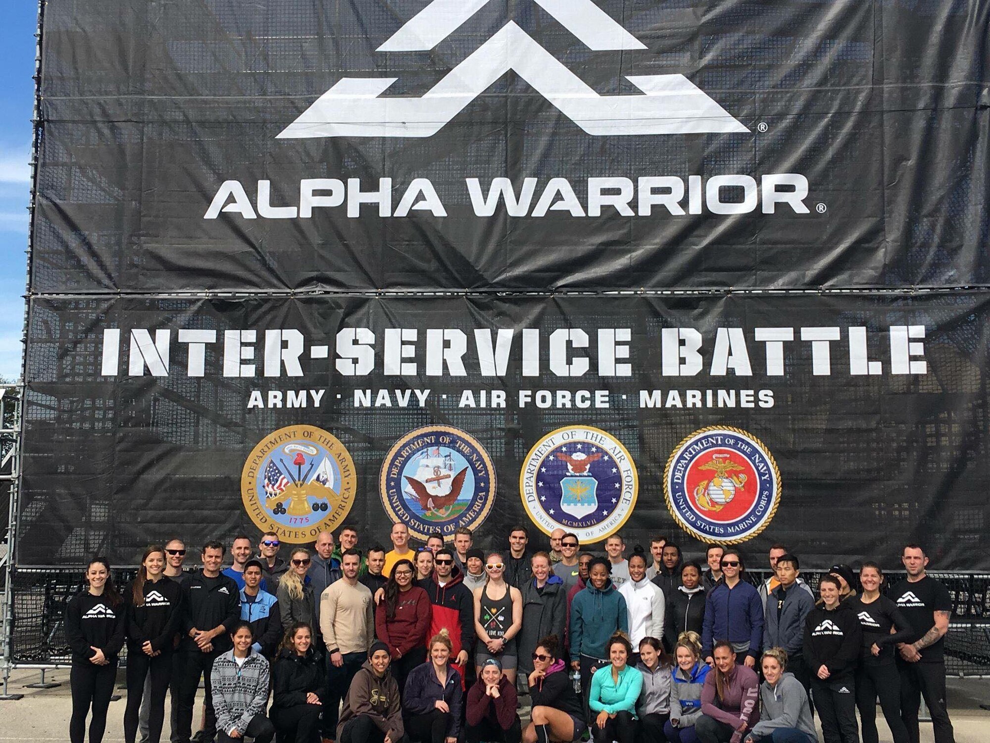 The Air Force team from across the globe stand together Nov. 17, 2018, at the Alpha Warrior Competition held at the Alpha Warrior Proving Grounds, Selma, Texas. The goal of the Alpha Warrior program is to increase functional fitness and mindfulness of today’s military members. (Curtesy photo)