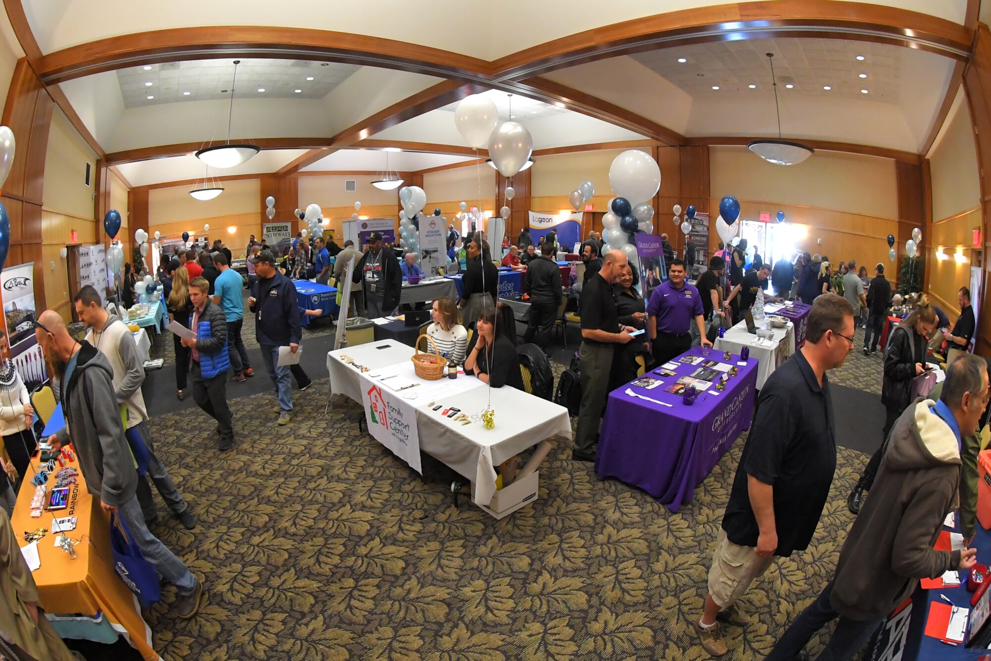 Military and civilians employees during the 75th Force Support Squadron Winter Expo Nov. 15, 2018, at Hill Air Force Base, Utah. This year's expo showcased vendors and information from 30 colleges, local ski resorts and even Disney, with the intent of building a thriving and resilient community through travel, recreation, education, wellness, and fun. (U.S. Air Force photo by Todd Cromar)