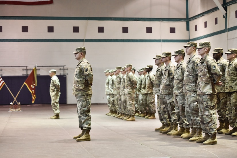 U.S. Army Soldiers from 97th Transportation Company stand before the audience during a deployment ceremony at Joint Base Langley-Eustis, Virginia, Nov. 20, 2018. There are two crews deploying from the company will participate in the operation. (U.S. Army photo by Spc. Travis Teate)