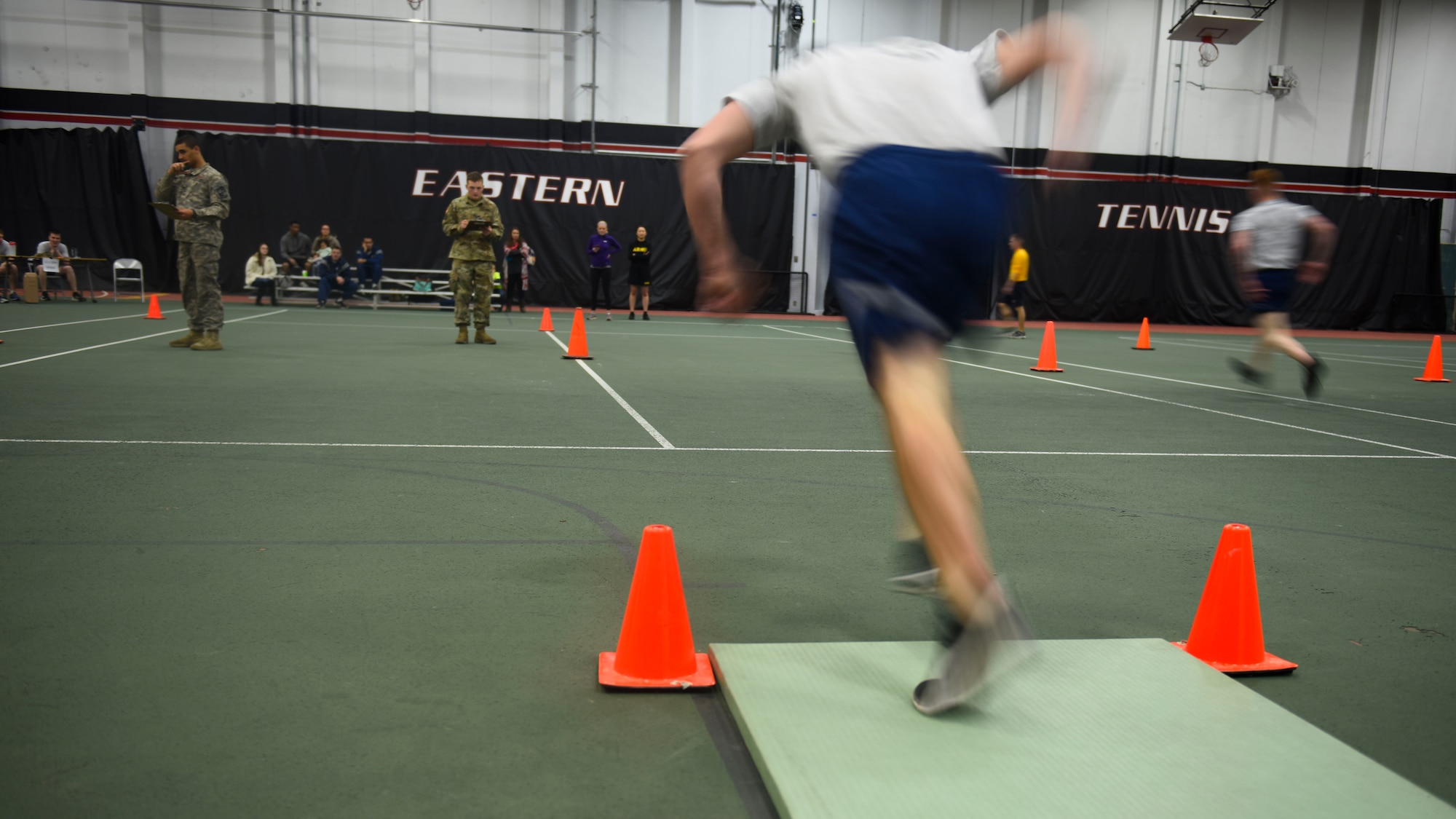 U.S. Air Force Lt. Col. Michael McCarthy, 92nd Medical Operations Squadron commander, performs shuttle-sprints as part of the German Armed Proficiency Badge competition Nov. 17, 2018, at Eastern Washington University in Cheney, Washington. In the U.S. Armed Forces, the GAFPB is one of the few approved foreign awards authorized to be worn on uniforms, making it one of the most sought after achievements. (U.S. Air Force photo/Airman 1st Class Lawrence Sena)